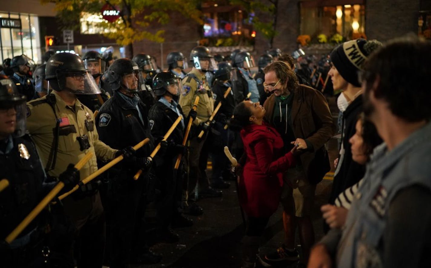 A couple danced between the lines of police and protesters.