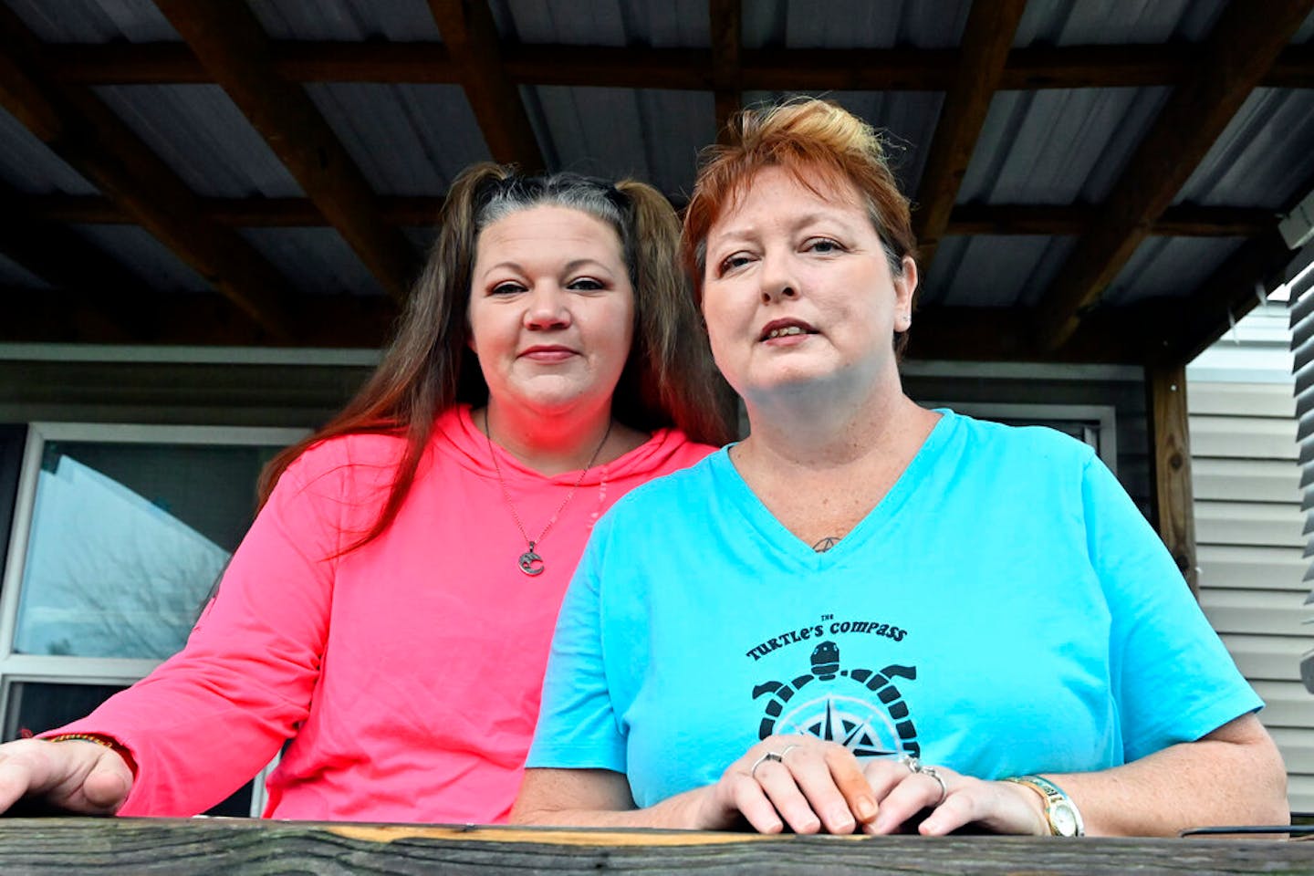 Tina Morton and her friend Elizabeth Willoughby on the porch of Morton's home in Winchester, Ky., Friday, Dec. 4, 2020. They are just a couple of the 87,688 Kentuckians who will lose unemployment assistance in December and are worried about what will happen to their families when their Pandemic Unemployment Assistance runs out.