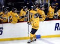 Quinnipiac's Sam Anas (7) celebrates his goal against UMass Lowell during the second period of the NCAA men's East Regional championship hockey game o