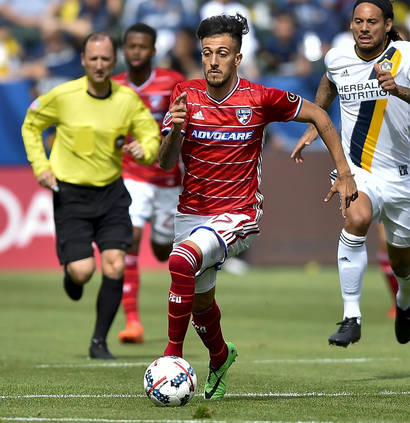 FC Dallas forward Maximiliano Urruti (37), of Argentina, breaks away as Los Angeles Galaxy midfielder Jermaine Jones (13), of Germany, attempts to catch up during the first half an MLS soccer match, Saturday, March 4, 2017, in Carson, Calif. (AP Photo/Gus Ruelas) ORG XMIT: CAGR101