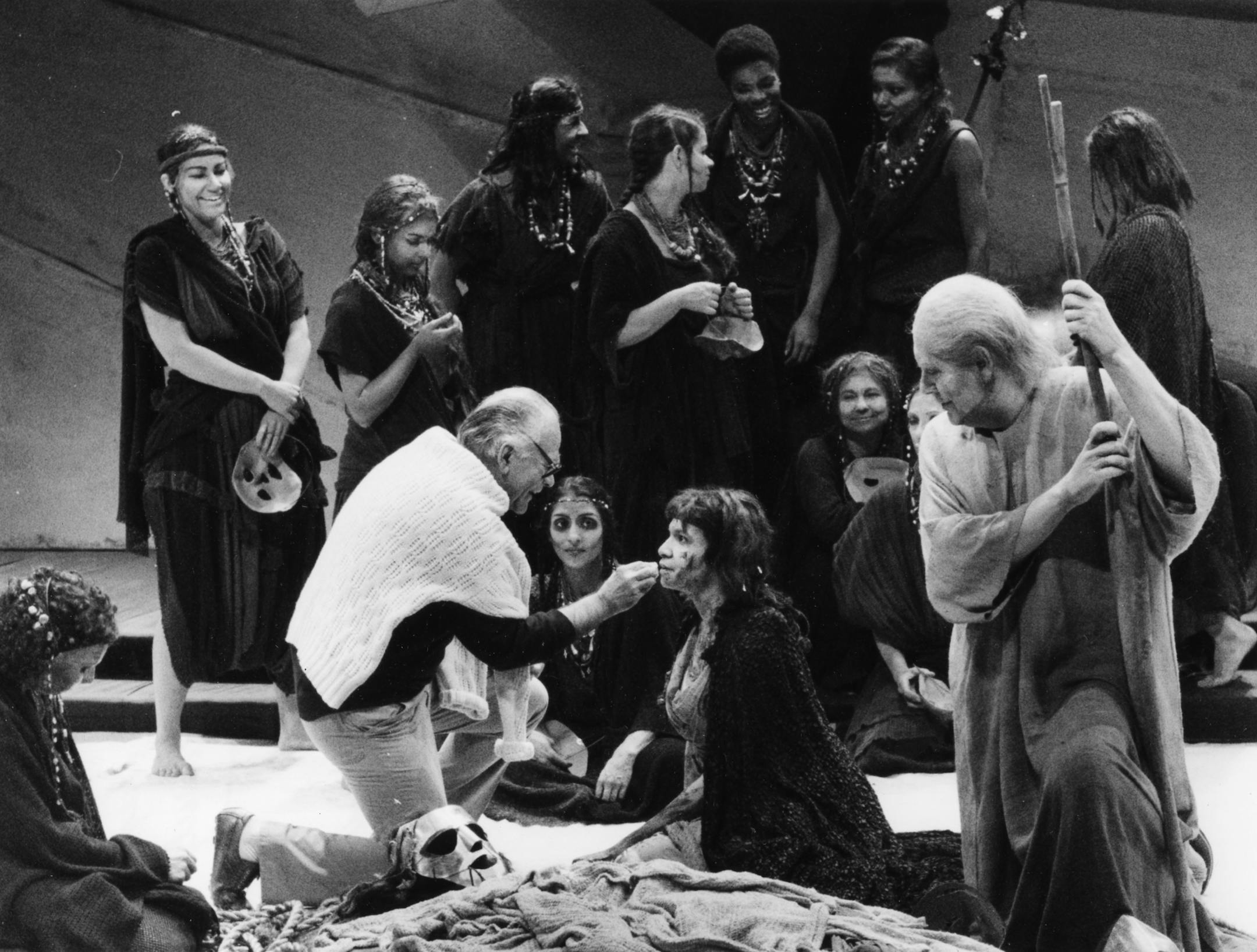 ( Former) Guthrie artistic director Liviu Ciulei ( center/white sweater) fixed a cast members makeup during a photo session, - 1987.