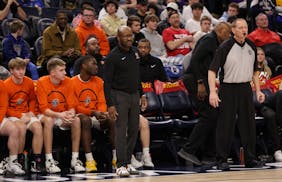 White Bear Lake coach Greg Burke watches the opening minutes of the game. Photo by Cheryl A. Myers, SportsEngine