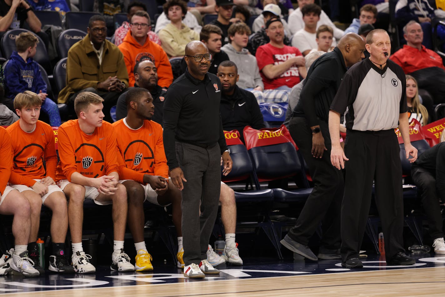 White Bear Lake coach Greg Burke watches the opening minutes of the game. Photo by Cheryl A. Myers, SportsEngine