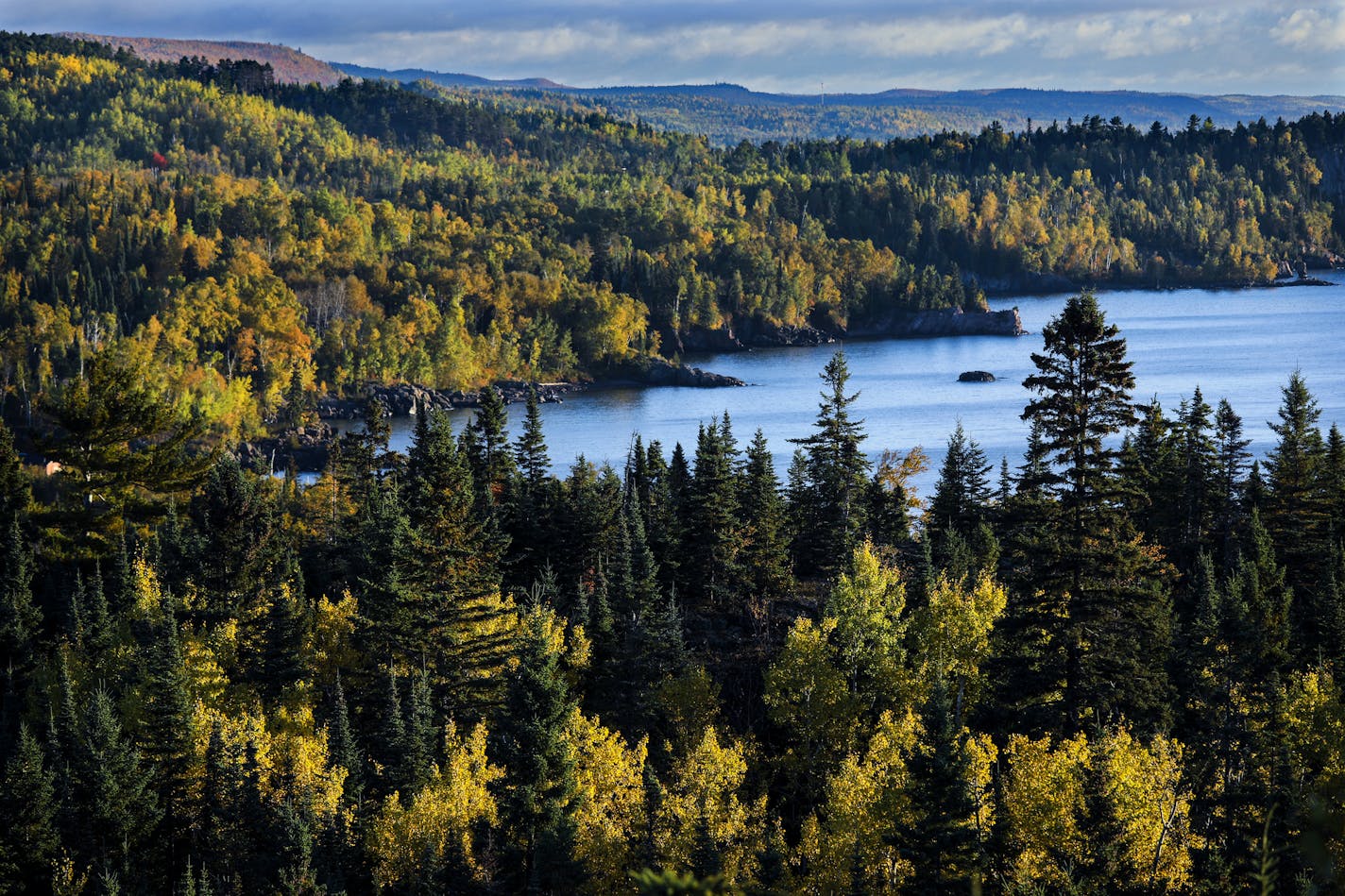 Northern Minnesota is the first to turn each fall and the mix of colors make for a spectacular show. The aspen, pine, maple and birch create a kaleidoscope of color that attract leaf watchers to travel backroads and fill hotel rooms and campgrounds on the north shore. The north shore at Tettegouche State Park is one of the most dramatic as the colors begin to turn. ] BRIAN PETERSON &#x2022; brian.peterson@startribune.com
North Shore, MN 10/05/2018