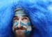 A Uruguay supporter waits for the start of the group D World Cup soccer match between Italy and Uruguay at the Arena das Dunas in Natal, Brazil, Tuesd