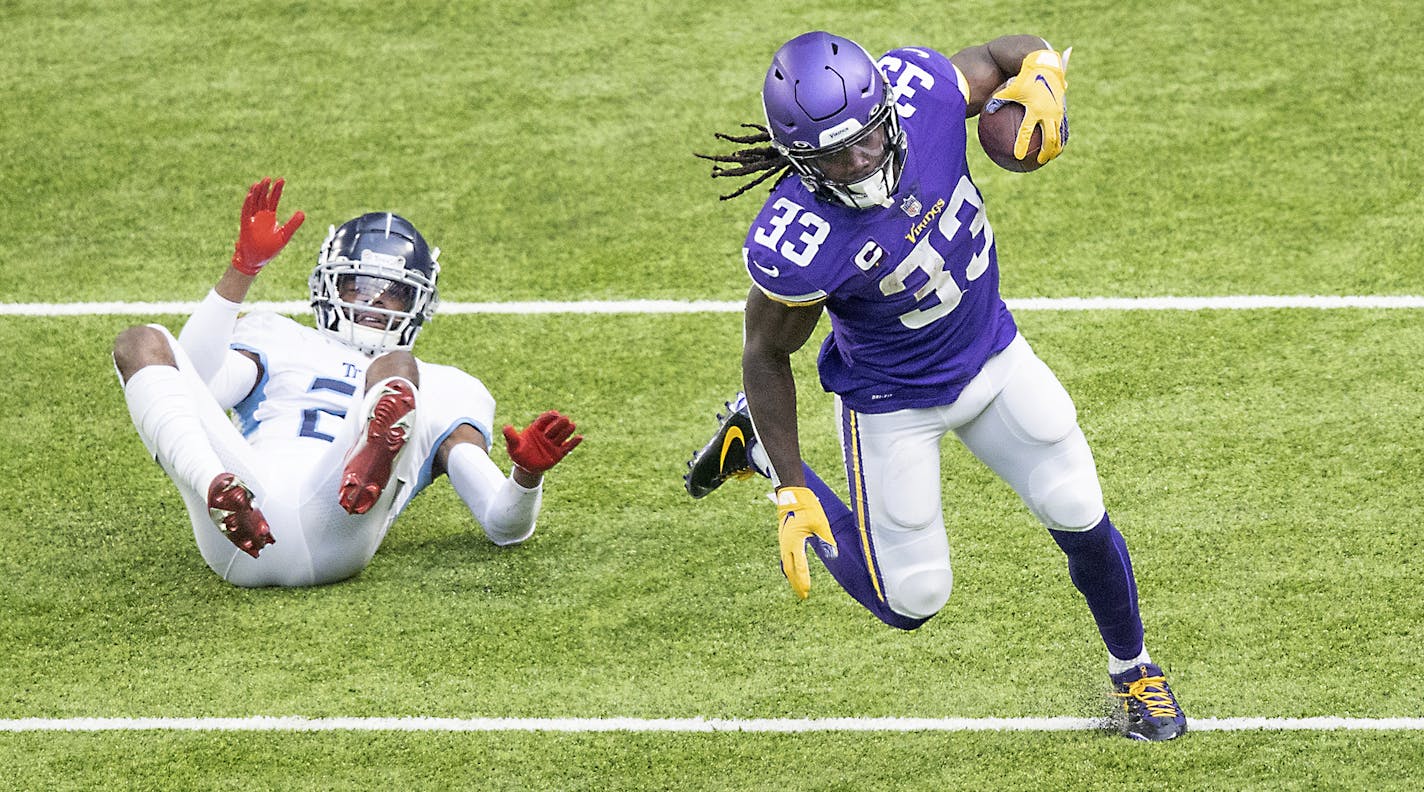 Minnesota Vikings running back Dalvin Cook ran for a first down leaving Tennessee Titans cornerback Malcolm Butler on his back in the third quarter as the Vikings took on the Tennessee Titans at US Bank Stadium, Sunday, September 27, 2020 in Minneapolis, MN. ] ELIZABETH FLORES • liz.flores@startribune.com