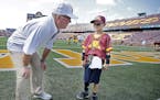 Griffin, 7, of Jordan, MN, was a special guest as the TCF Bank Kickoff Kid, was able to get on the field and meet with players and coaches including J