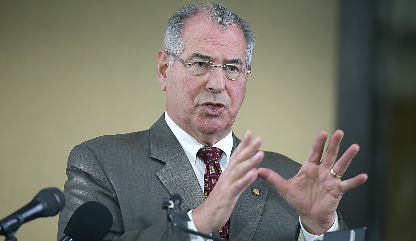 FILE - In this Nov. 30, 2015, file photo, Hennepin County Attorney Mike Freeman speaks during a news conference at the Hennepin County Government Center in Minneapolis, Minn. Freeman said Wednesday, March 16, 2016, that after months of careful consideration, he's decided he will not rely on a grand jury to determine whether two Minneapolis police officers should be charged in the shooting death of Jamar Clark. Freeman said he will make the charging decision himself. (Elizabeth Flores/Star Tribun