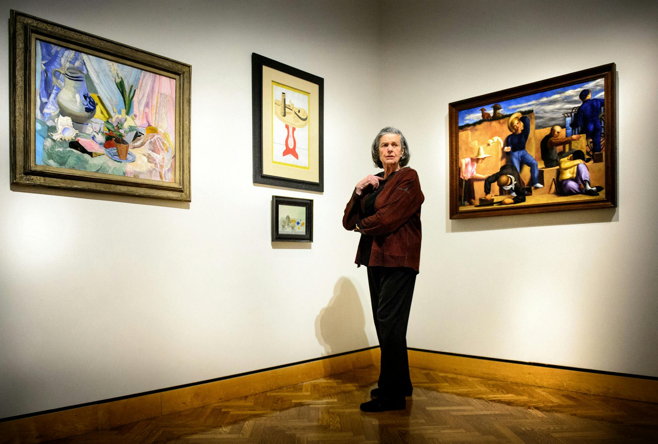 Anita Kunin toured the Minneapolis Institute of Arts exhibit of her late husband's 78 American modernist paintings art collection with MIA curator Patrick Noon.