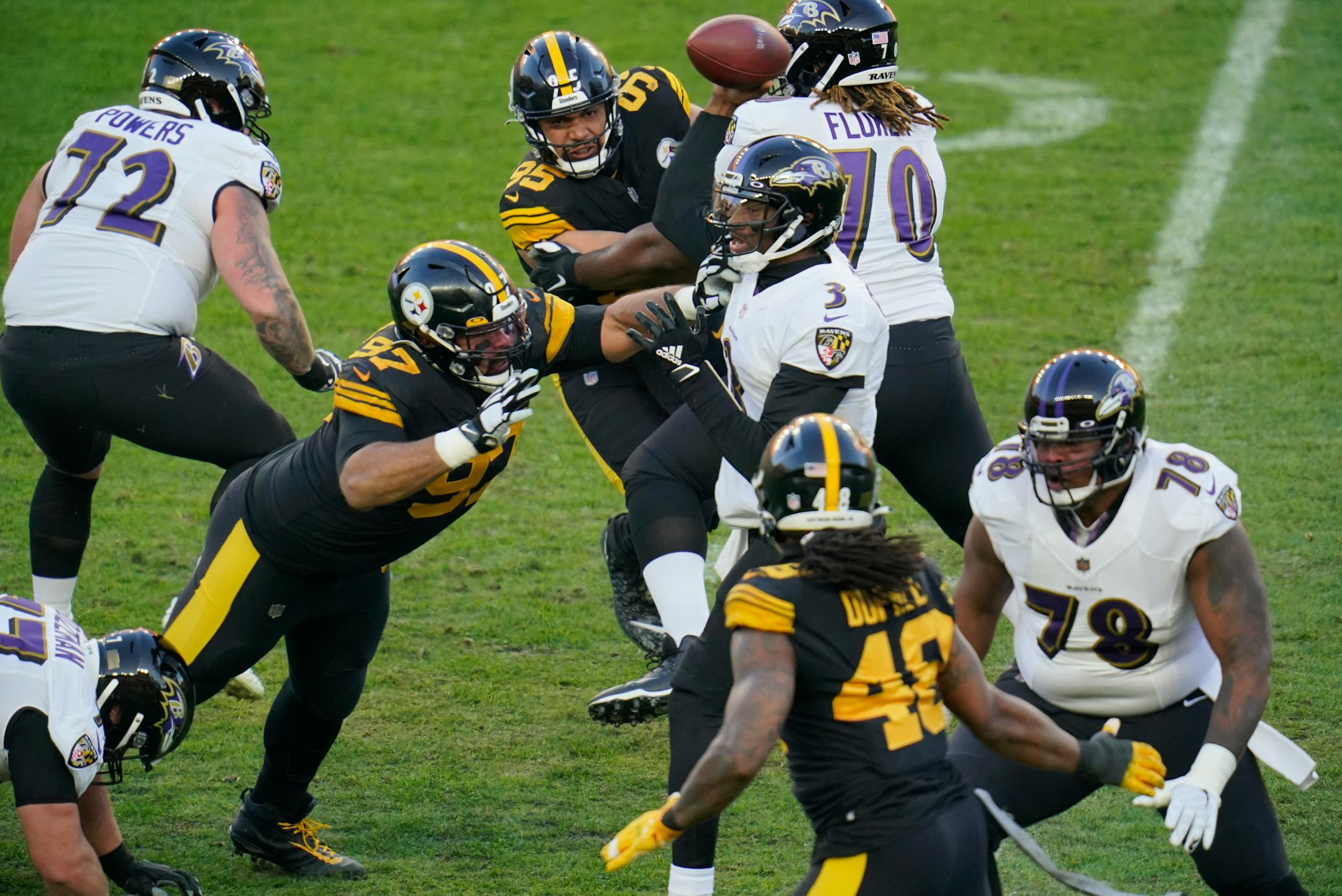 Ravens quarterback Robert Griffin III was sacked by Steelers defensive end Cameron Heyward (97) during the first half Wednesday. The Steelers won 19-14.