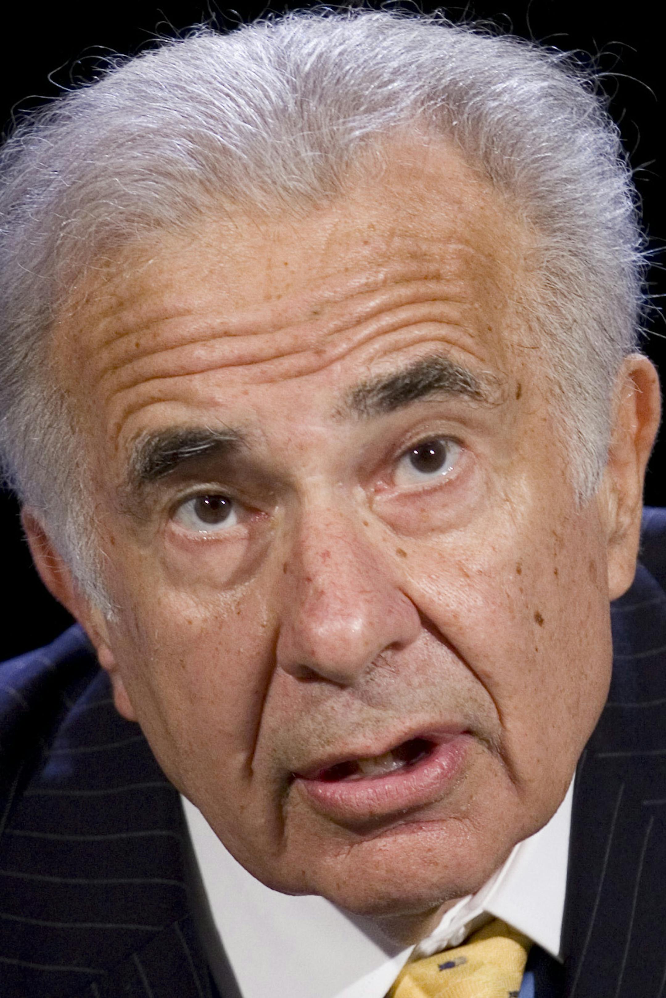 FILE - In this Oct. 11, 2007 file photo, activist investor Carl Icahn speaks at the World Business Forum in New York. Genzyme Corp. on Feb. 22, 2010. Icahn is giving back all of the money that outside investors hold in his hedge funds. In a letter to limited partners, the billionaire investor said he did not want to be responsible to investors for ìanother possible market crisis,î especially given the rapid increase in markets over the past two years. Icahn, who has built a reputation