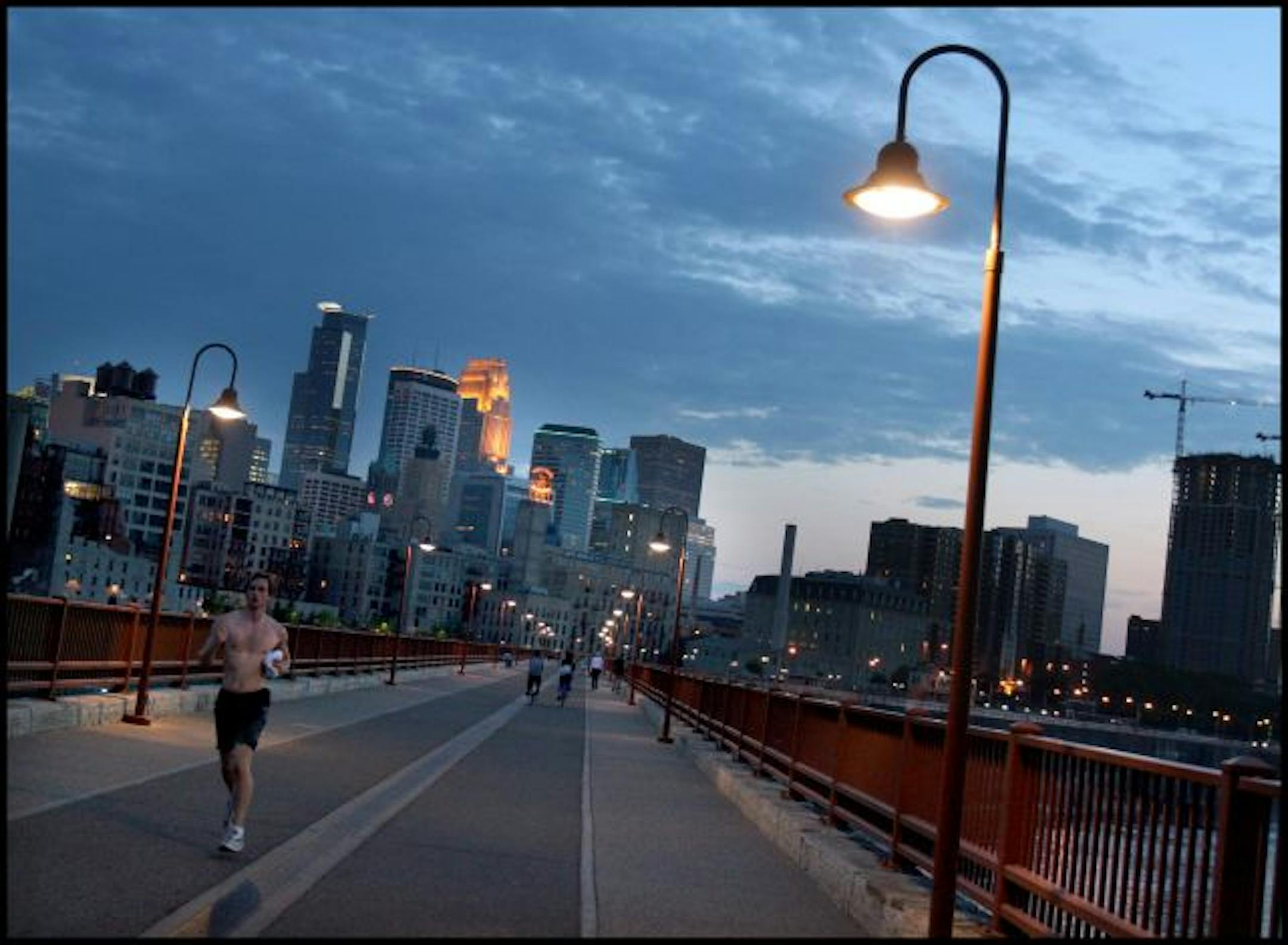 On the stone arched bridge.