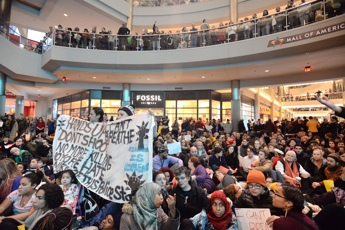 Protestors at the Mall of America in Bloomington, Minn., on Saturday, Dec. 20, 2014, during a demonstration to focus attention on perceived nationwide race-based police misconduct. (Aaron Lavinsky/Minneapolis Star Tribune/TNS) ORG XMIT: MIN1412201808380099