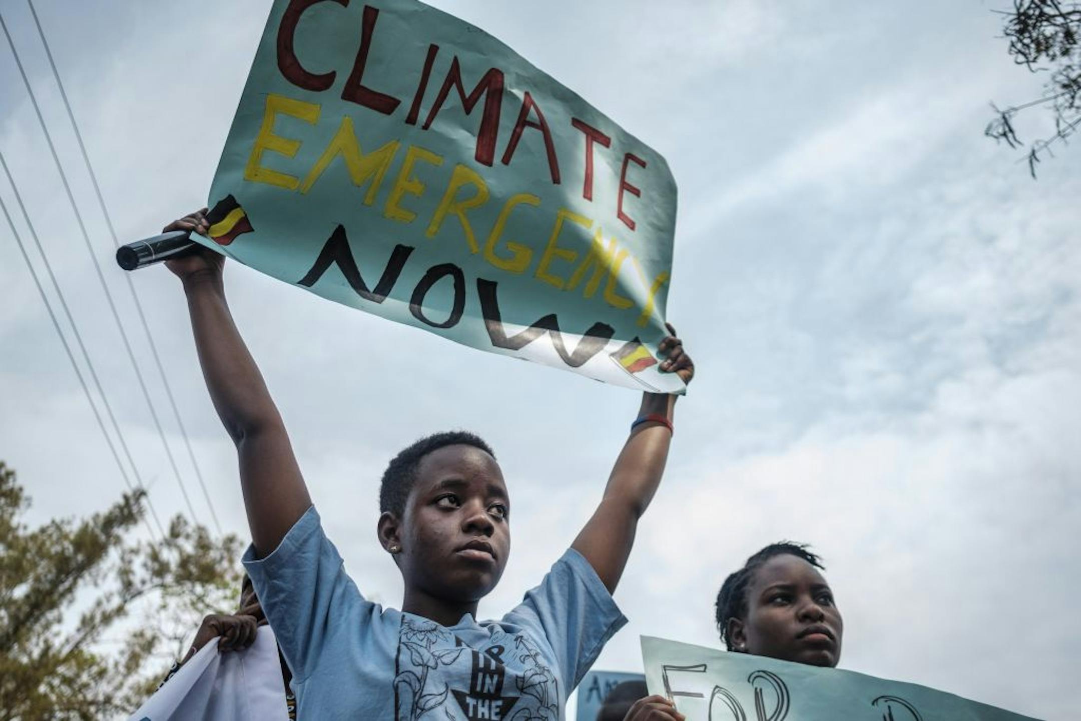 Leah Namugerwa, 15, a climate activist, leads a march of a variety of demonstrators Ð including students, parents, farmers and local leaders Ð march in protest of climate change through Wakiso town, on the outskirts of Kampala, Uganda, on Friday, Sept. 20, 2019. Anxious about their future on a hotter planet, angry at world leaders for failing to arrest the crisis, thousands of young people began pouring into the streets on Friday for a day of global climate protest.