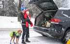 Mackenzie Havey, husband Jason and their kids Liesl, 3, and Liv, 5 months, along with their Vizsla, Welly, got ready for some winter fun in Arden Park