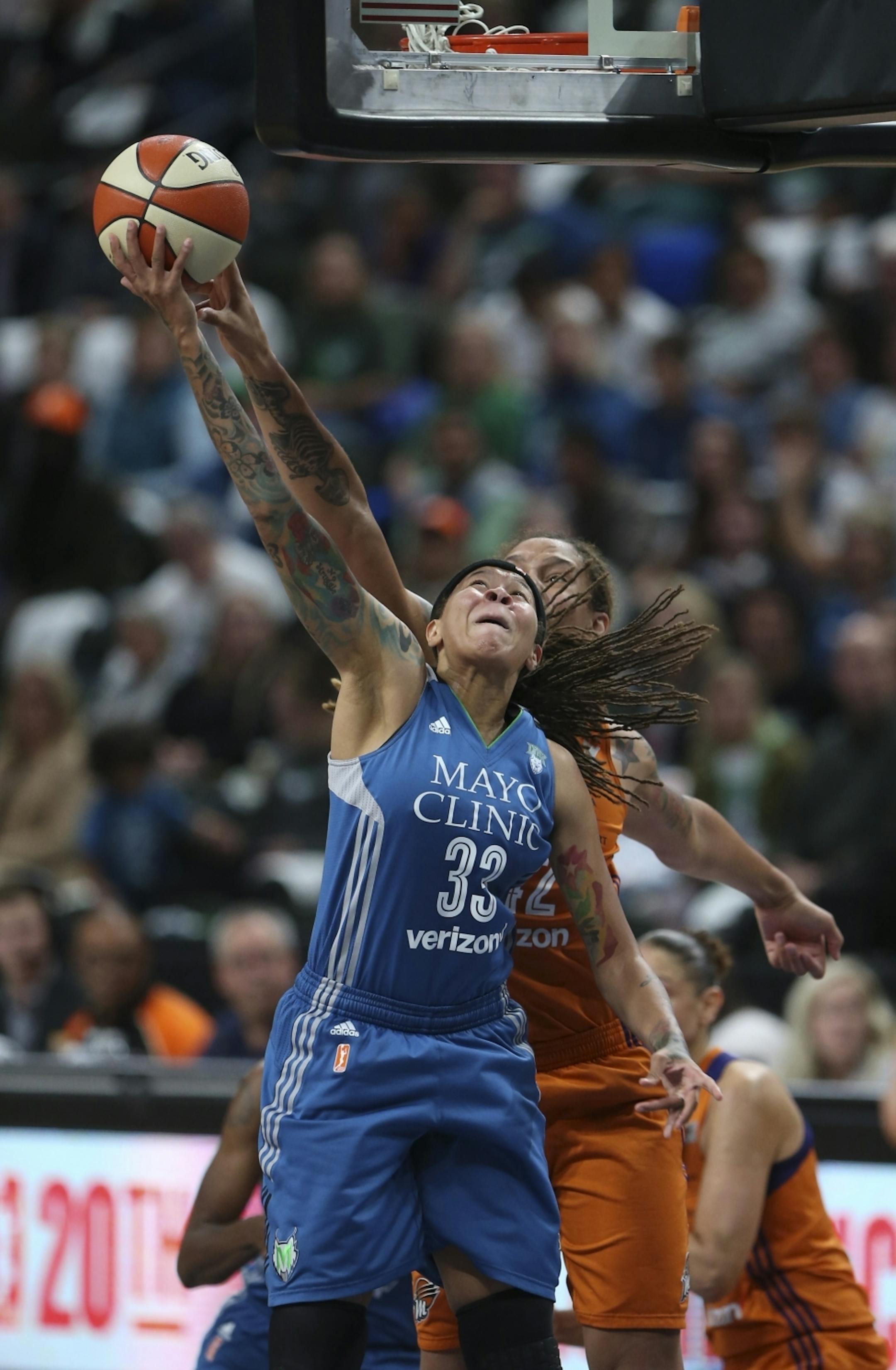 Minnesota Lynx guard Seimone Augustus (33) had her shot blocked by Phoenix Mercury center Brittney Griner (42) in the second quarter.