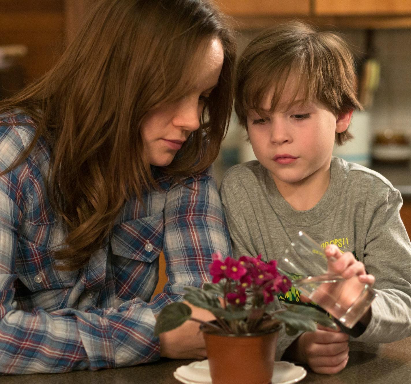 In this image released by A24 Films, Brie Larson, left, and Jacob Tremblay appear in a scene from "Room." (George Kraychyk/A24 Films via AP)