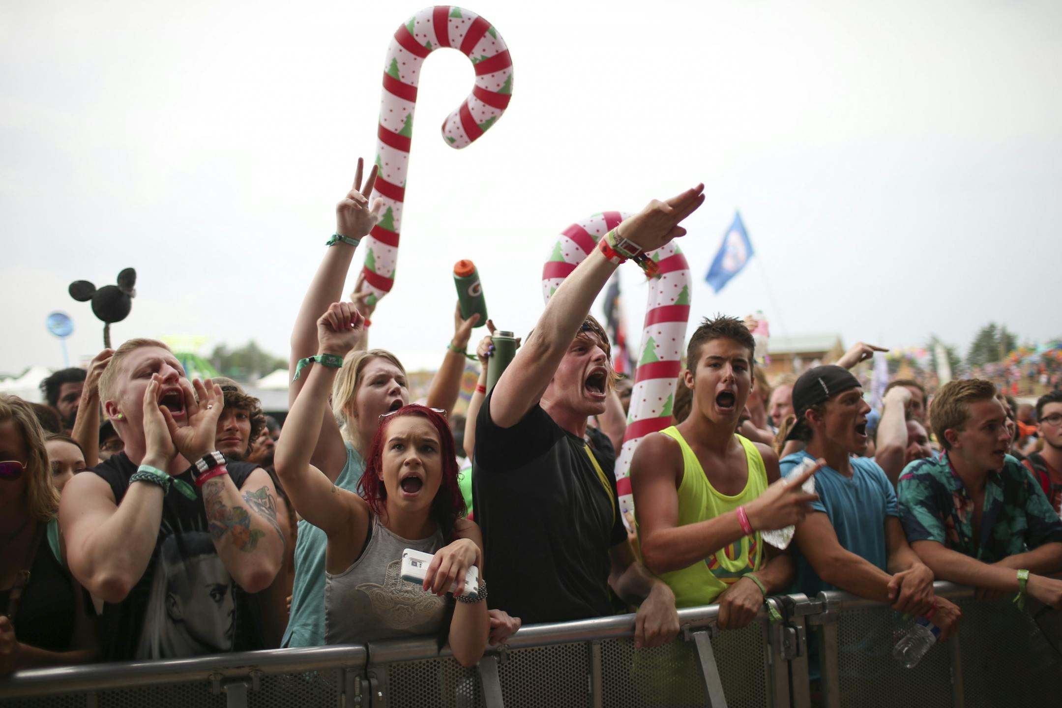 Fans at the front of the main stage began shouting "rain or shine" after a weather delay was announced at Summer Set Sunday evening.