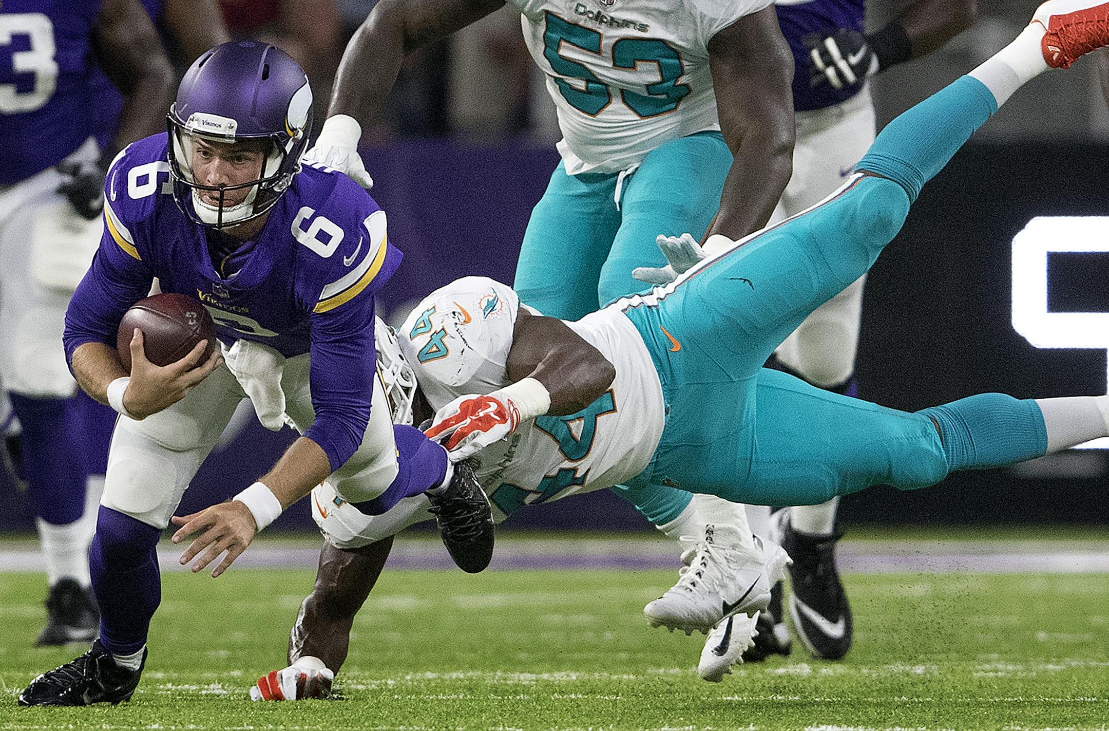 Vikings quarterback Taylor Heinicke (6) was tackled by Deon Lacey (44) in the first quarter. ] CARLOS GONZALEZ ï cgonzalez@startribune.com - August 31, 2017, Minneapolis, MN, US Bank Stadium, NFL, Minnesota Vikings vs. Miami Dolphins