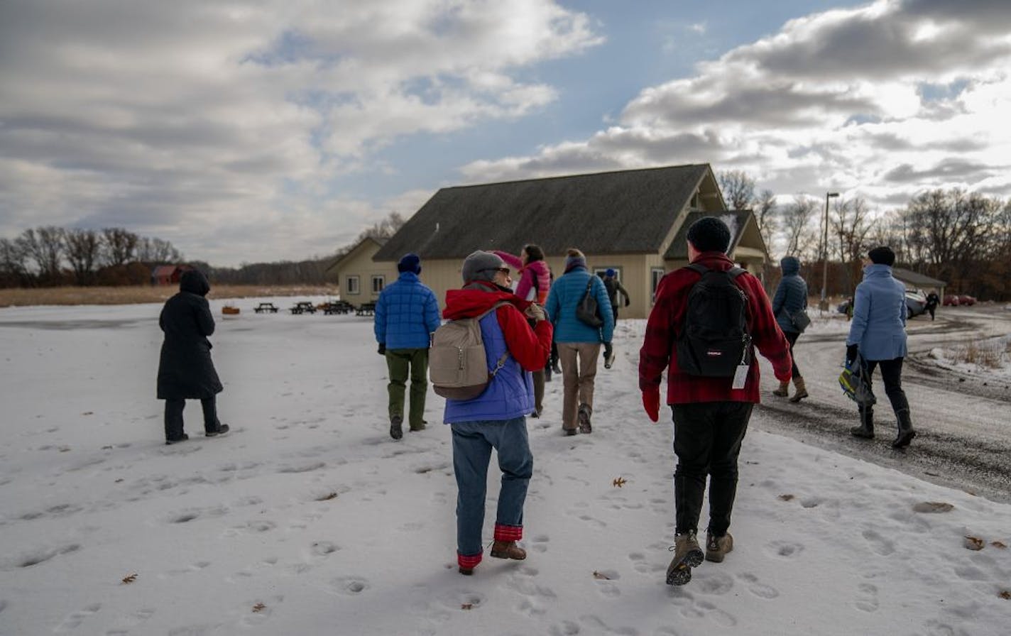 University of Minnesota Researcher Caitlin Potter led a group of potential volunteers to see a camera that is being used to document what kinds of animals are in the area, during a class about the new "Eyes on the Wild" project at Cedar Creek, Tuesday, January 8, 2019 in East Bethel, MN.