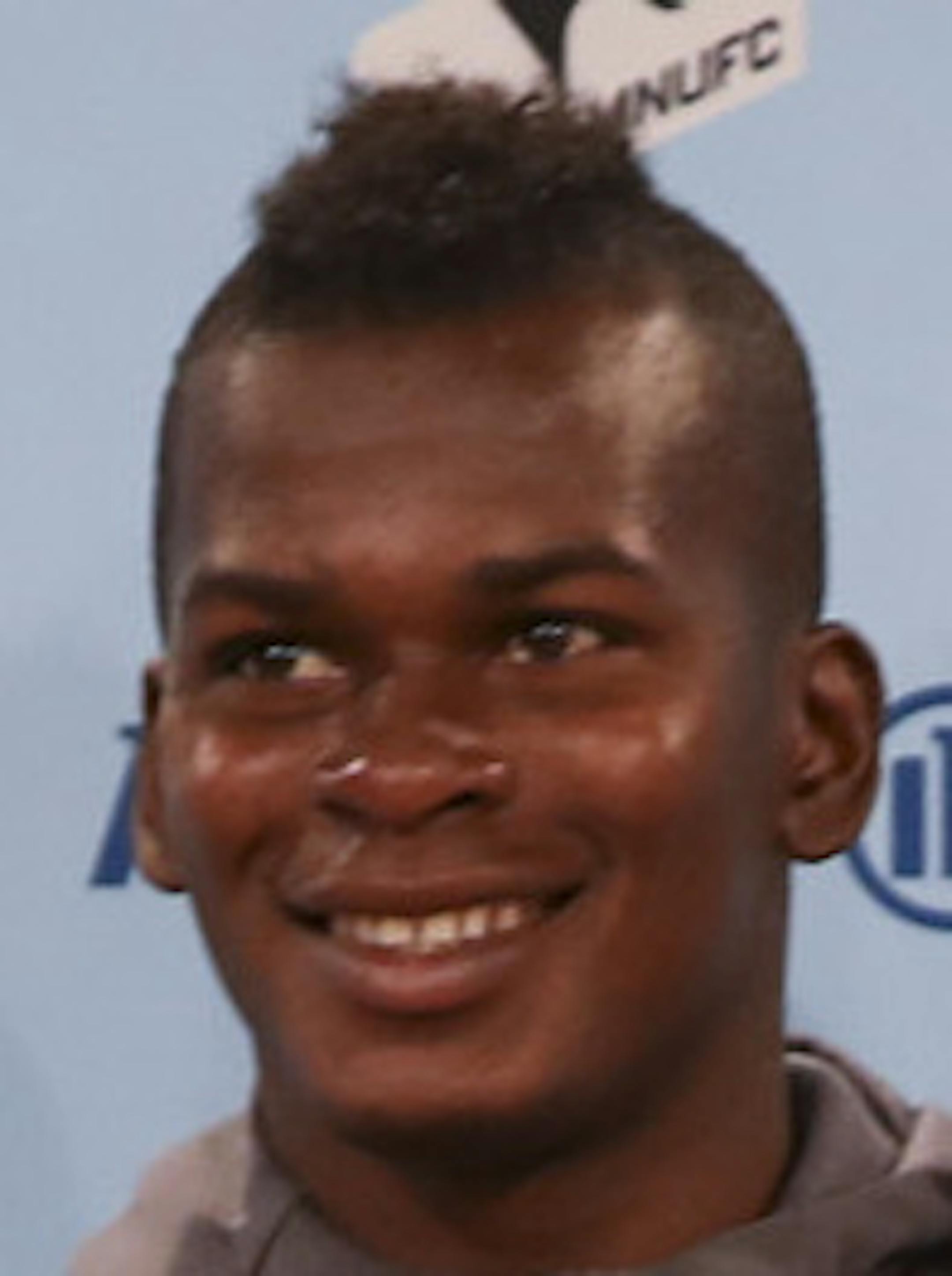 Darwin Quintero held up his new jersey after the news conference where he was introduced Monday afternoon. At right is team public relations manager Jessica Lopez. ] JEFF WHEELER ï jeff.wheeler@startribune.com The Minnesota United Football Club introduced the team's first high-profile - and highly paid - designated player, Darwin Quintero, at a news conference in St. Paul Monday afternoon, April 2, 2018.