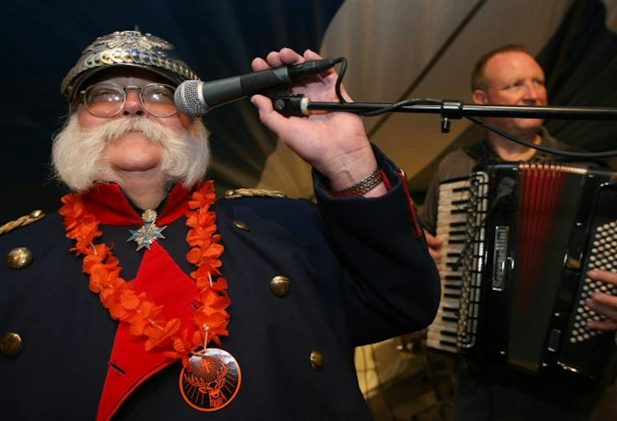 Bruce Larson "A.K.A. the Keiser," takes the mic to sing a tune with the Bill Koncar Band