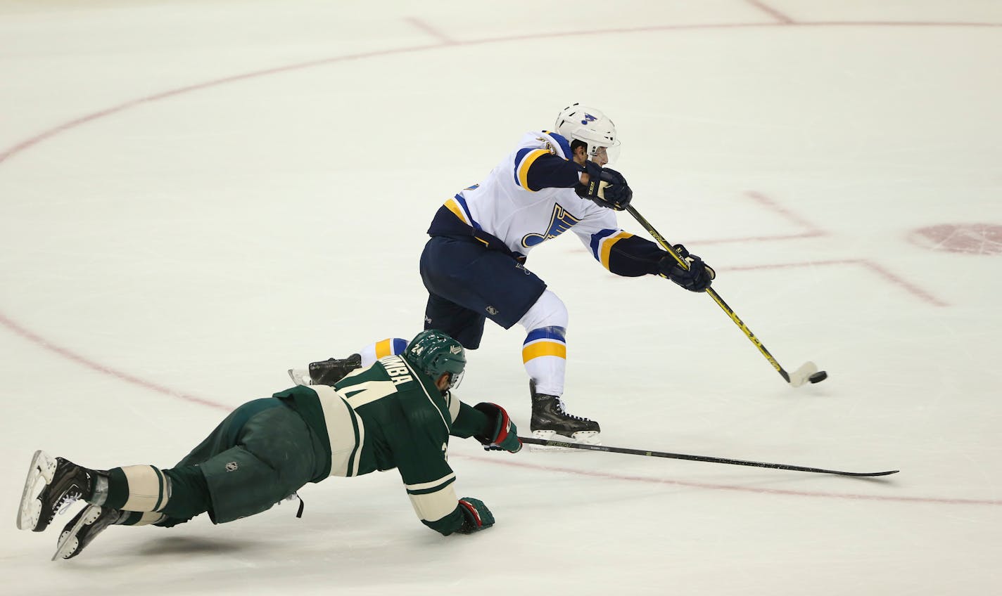 Wild defenseman Matt Dumba tried in vain to keep Blues center Robby Fabbri from scoring an empty-net goal late in the third period of St. Louis' 4-2 victory Sunday night.