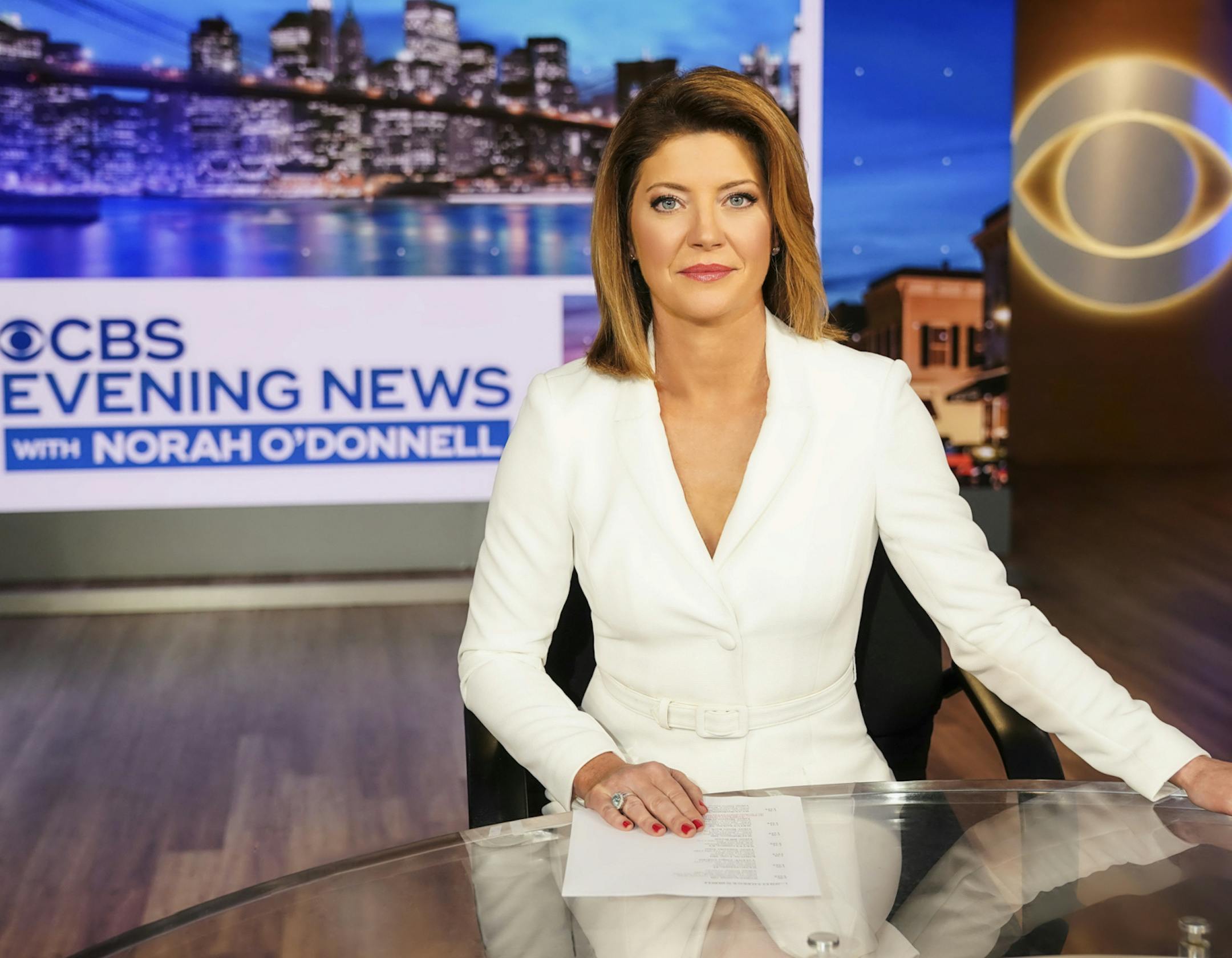 This image released by CBS shows Norah O'Donnell, host of the new "CBS Evening News with Norah O'Donnell." S News is making changes with its evening newscast, and the first happens on Monday, July 15, 2019, when Norah O’Donnell takes over as anchor. The second comes in the fall, when the network pulls up stakes from its New York headquarters and moves into a new studio in Washington. (Michele Crowe/CBS via AP)