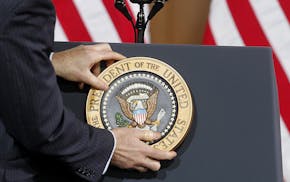 President Barack Obama presidential emblem was placed on the podium before he spoke to a crowd at the Union Depot, Wednesday, February 26, 2014 in St.