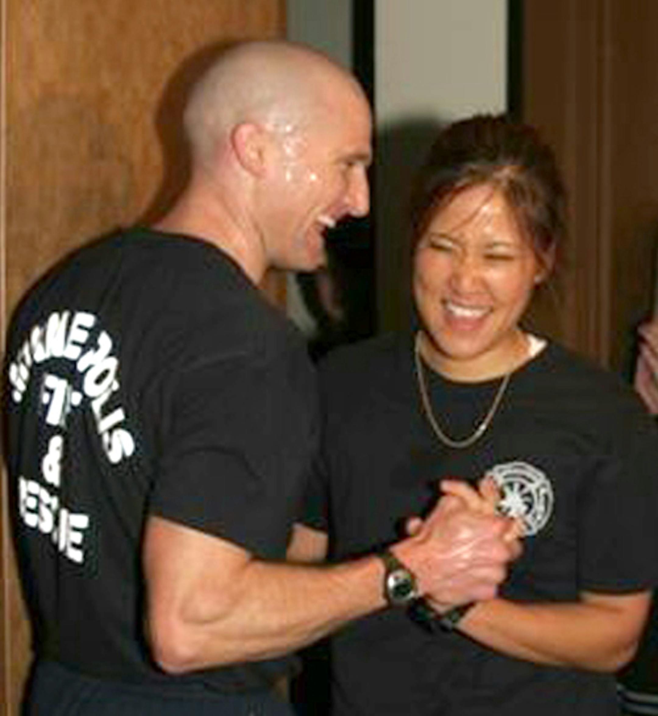 Daniel Casper congratulated his wife, Linda Sone, at the finish of last year's IDS Tower "Climb for a Cure" in Minneapolis. The Minneapolis firefighters, competed in the Empire State Building Run-Up in New York City this week.