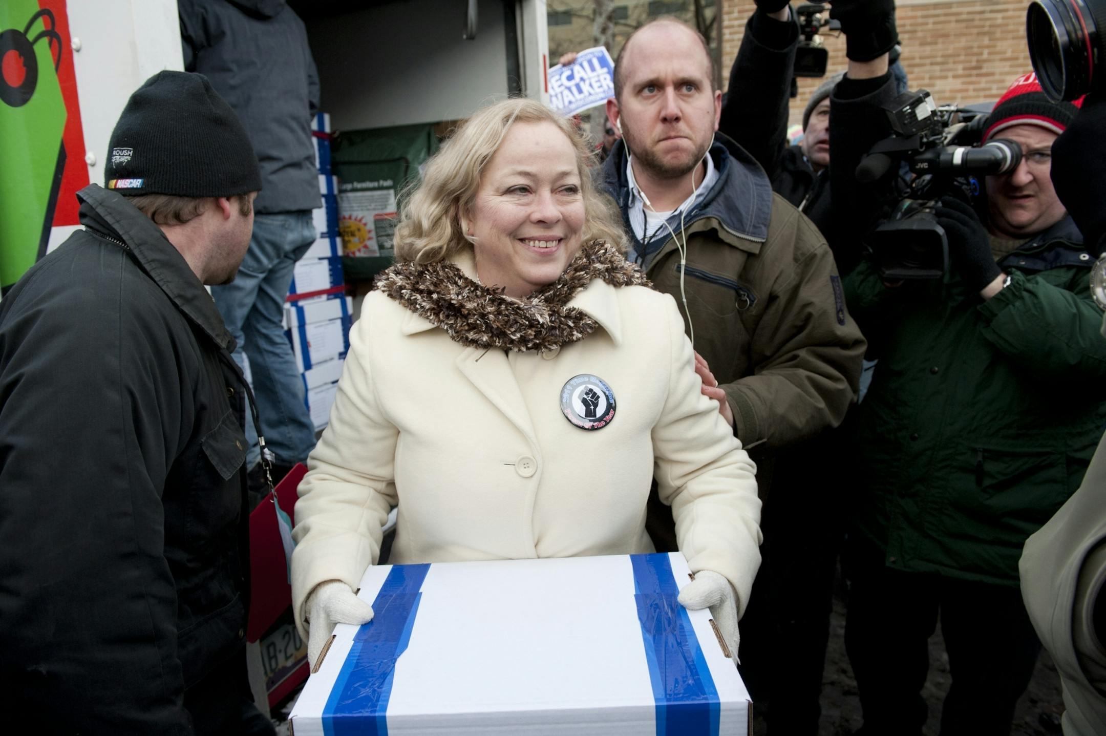 Julie Wells, of United Wisconsin, the Jefferson County grandmother and factory worker who triggered the recall, carried the first box of recall signatures to Wisconsin's Government Accountability Board.