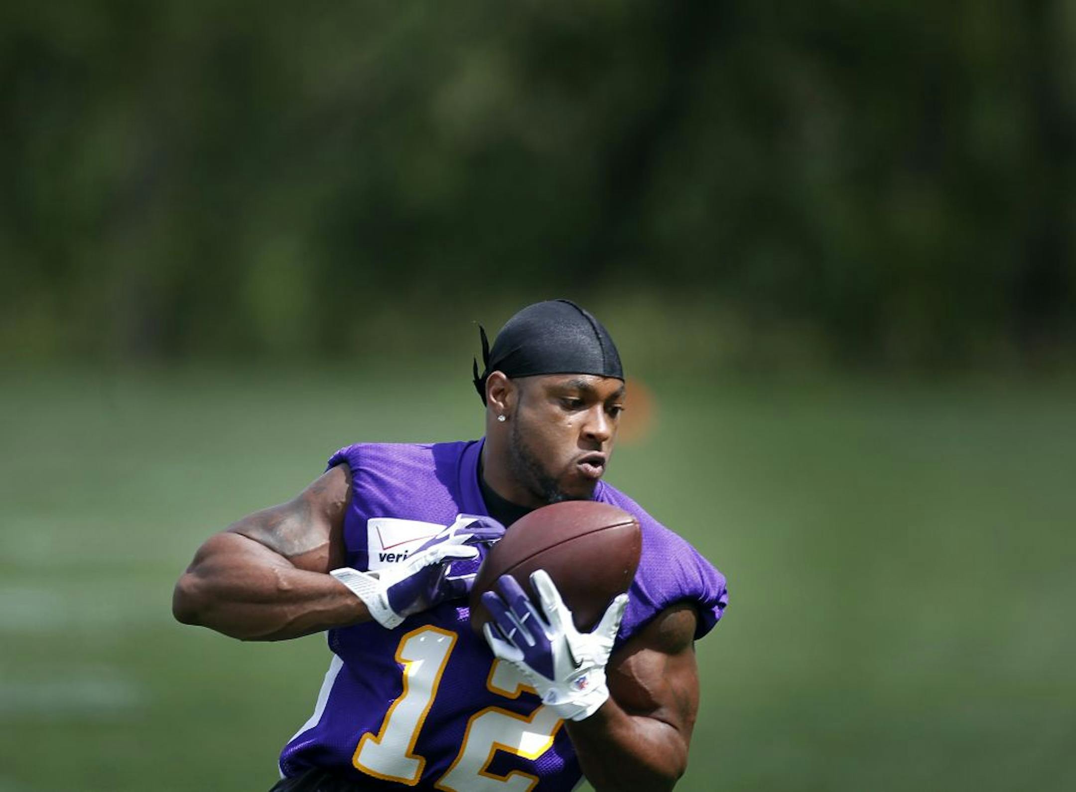 The appearance of the Vikings' Percy Harvin at OTAs means a lot to some of the team's young receivers.