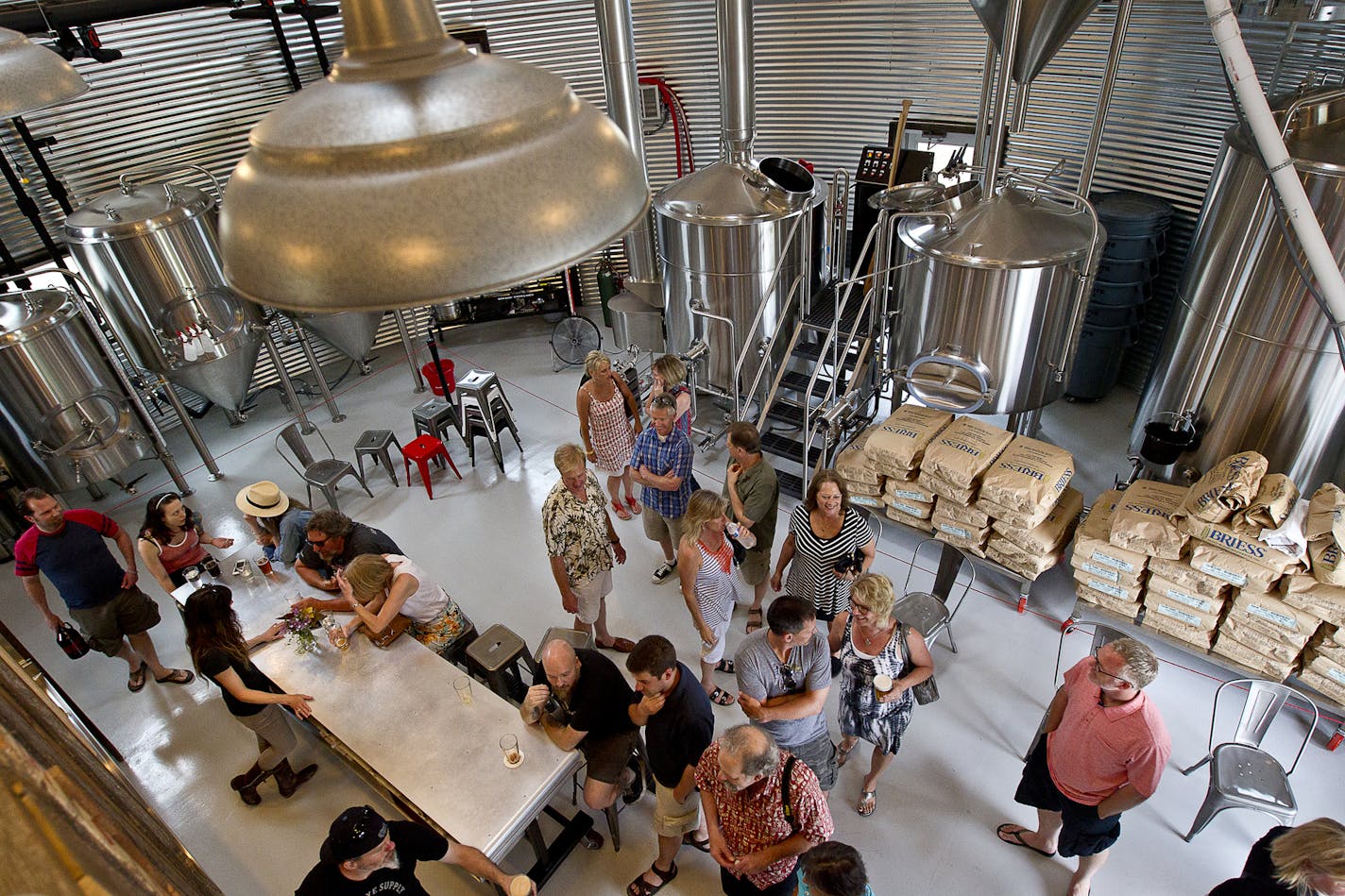 Beer enthusiasts enjoy samples at Bang Brewing Company in St. Paul, Saturday, May 31, 2014. [ BEN BREWER &#x201a;&#xc4;&#xa2; Special to the Star Tribune _ Assignments # 20034753A DATE: May 31, 2014 SLUG: greenline.vita EXTRA INFORMATION: