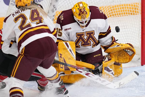 Fifth-year senior defenseman Olivia Knowles (24) and sixth-year goaltender Lauren Bench are back to help anchor the Gophers women’s hockey team defe