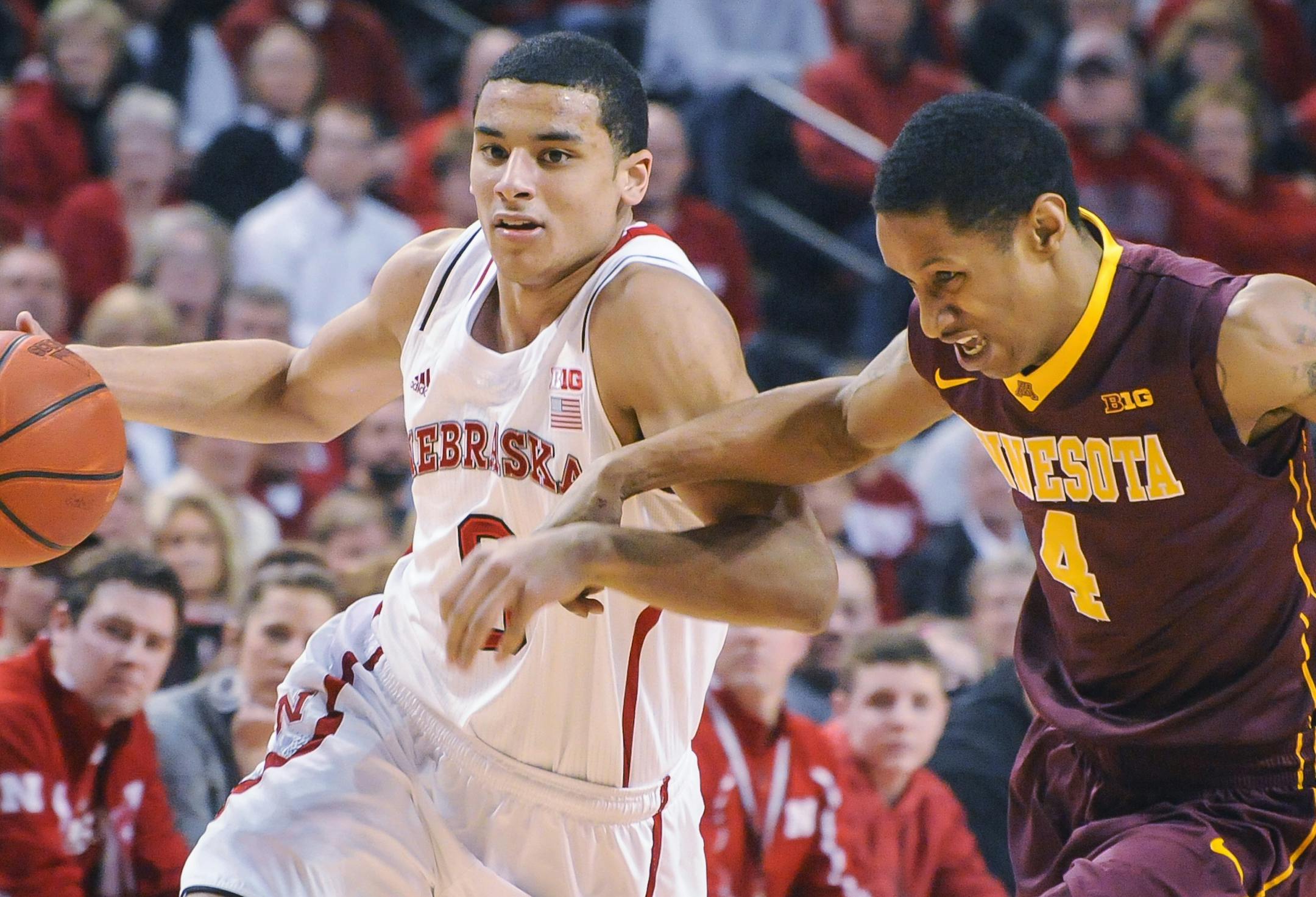 Nebraska guard Tai Webster drove by Gophers guard DeAndre Mathieu during the Cornhuskers’ victory in Lincoln earlier this year, a victory which puts Nebraska in a better position to enter the NCAA basketball tournament than Minnesota.