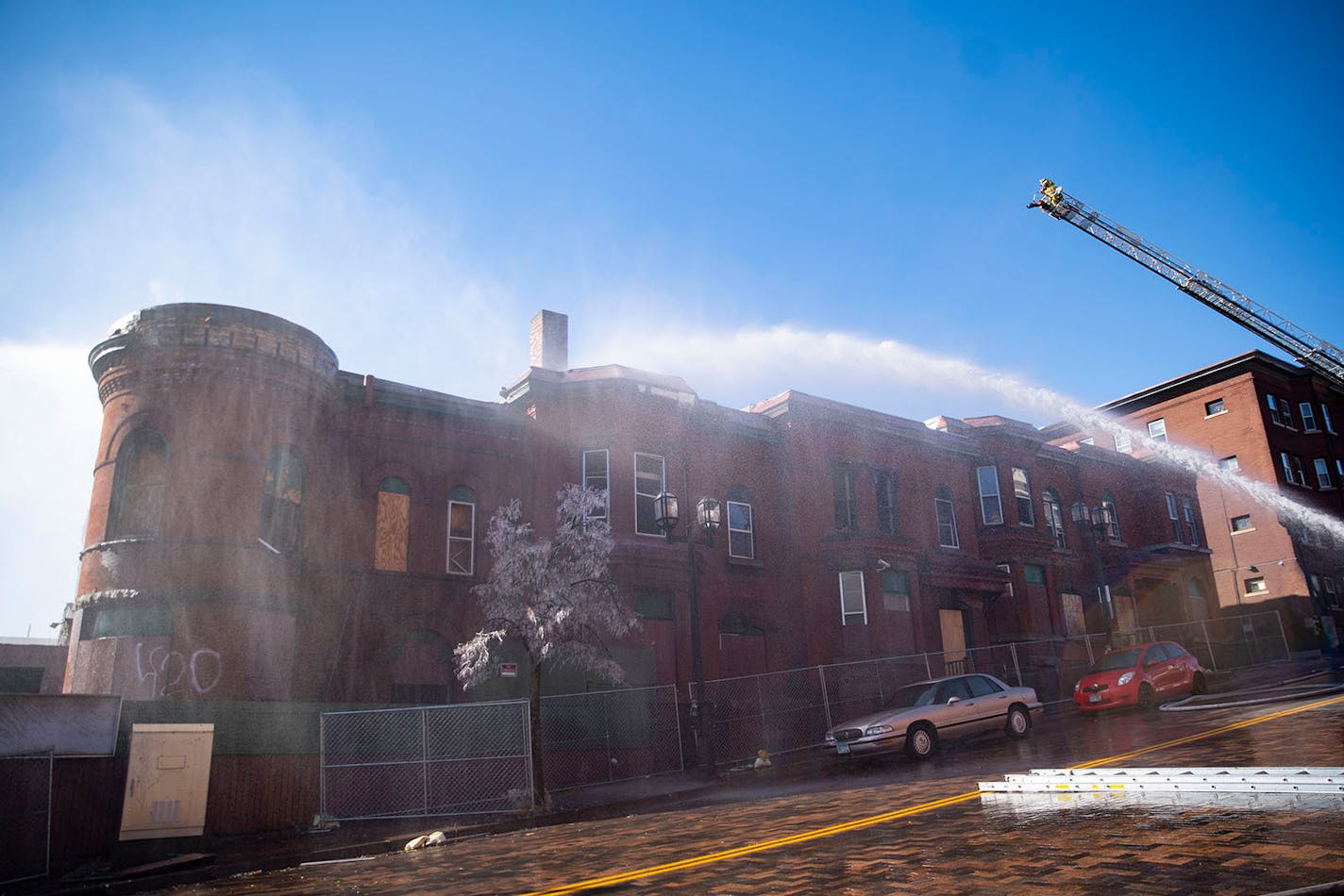 Duluth firefighters worked at putting out a fire at the former Paul Robeson Ballroom and Kozy Bar on Sunday morning.