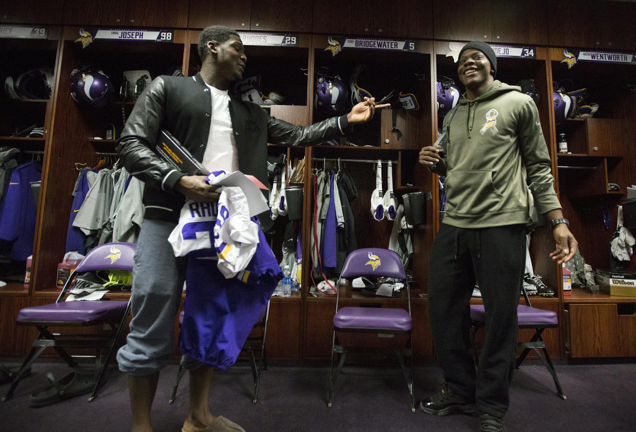 Vikings rookie quarterback Teddy Bridgewater (right) and Xavier Rhodes joke around as they packed up their things at Winter Park Monday morning.