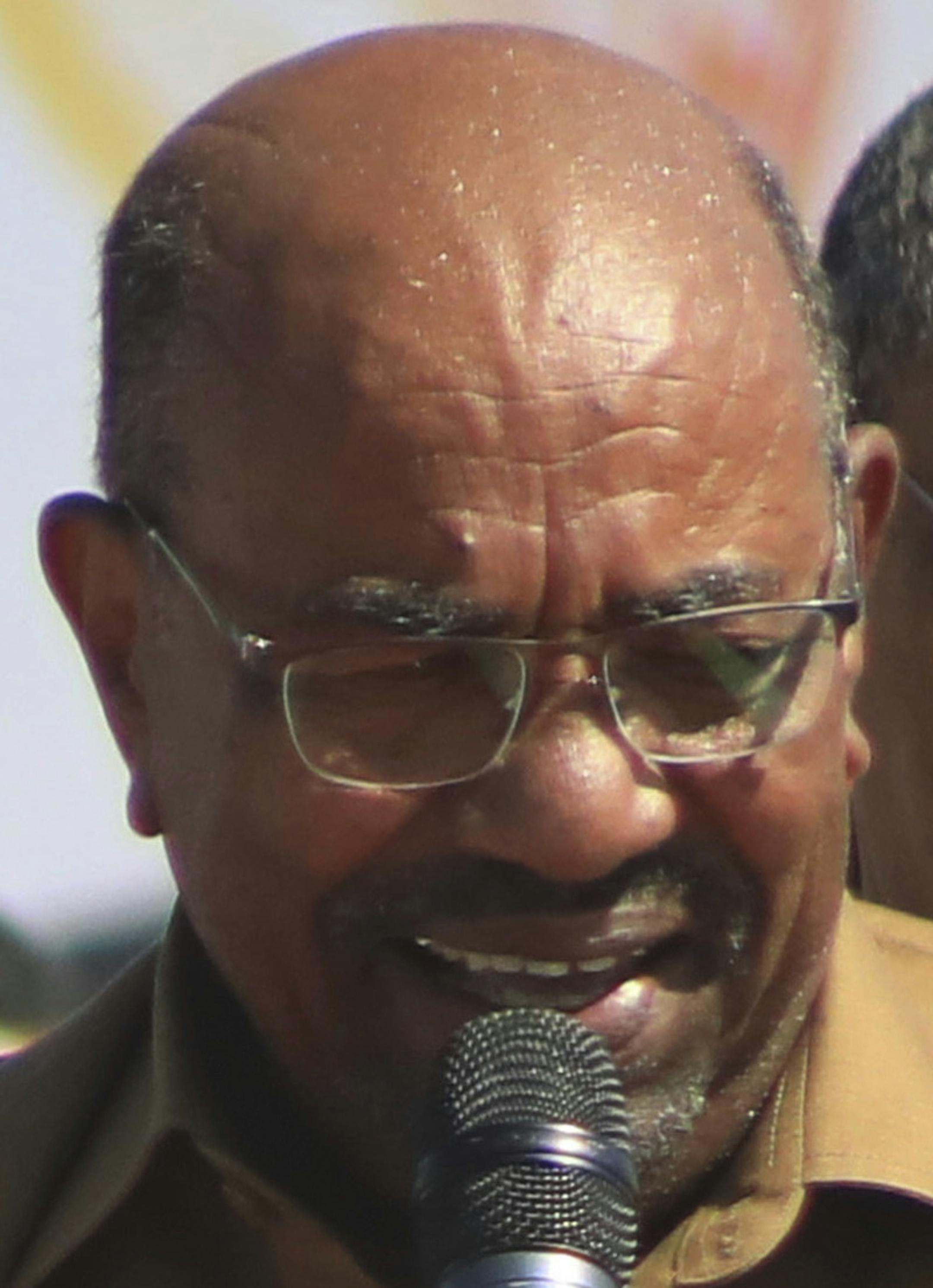 FILE - In this Jan. 9, 2019 file photo, Sudan's President Omar al-Bashir addresses supporters at a rally in Khartoum, Sudan. On Tuesday, Feb 12, 2019, hundreds of demonstrators are gathering in different Sudanese cities, protesting against autocratic al-Bashir. The demonstrations, were called by the Sudanese Professionals Association, an umbrella of independent professional unions. Video footage shows demonstrators gathering at intersections chanting "just fall," and calling for a "people's revo
