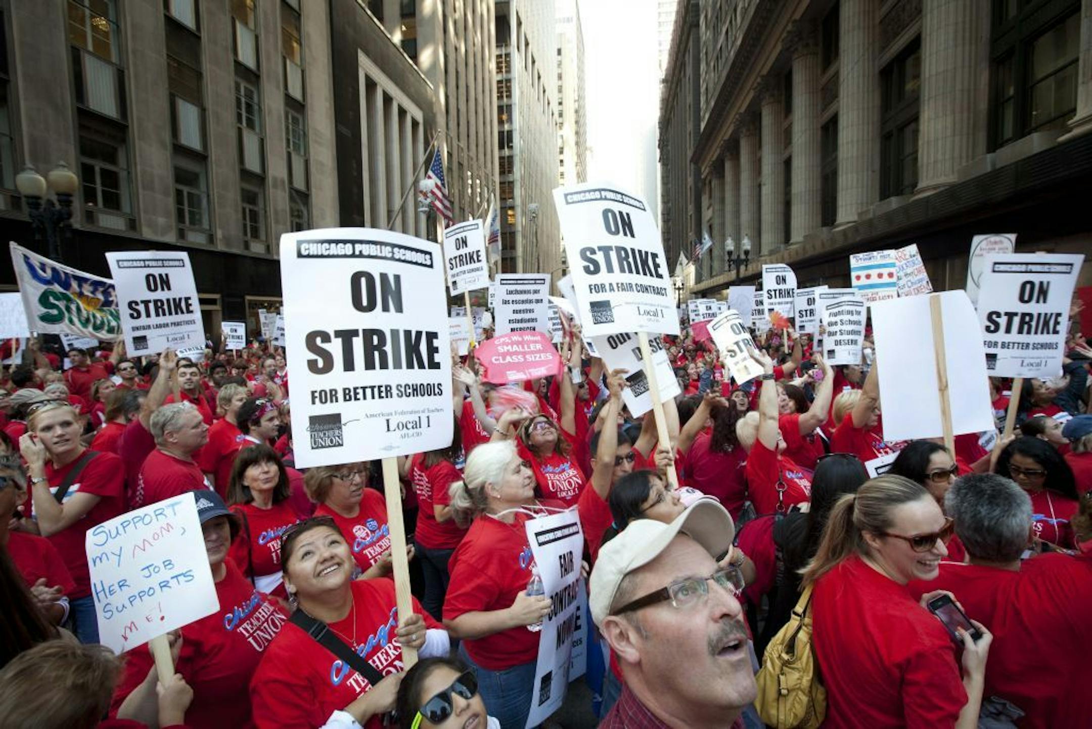 Thousands of public school teachers rally outside Chicago Public Schools district headquarters on the first day of strike action over teachers' contracts on Monday, Sept. 10, 2012 in Chicago.