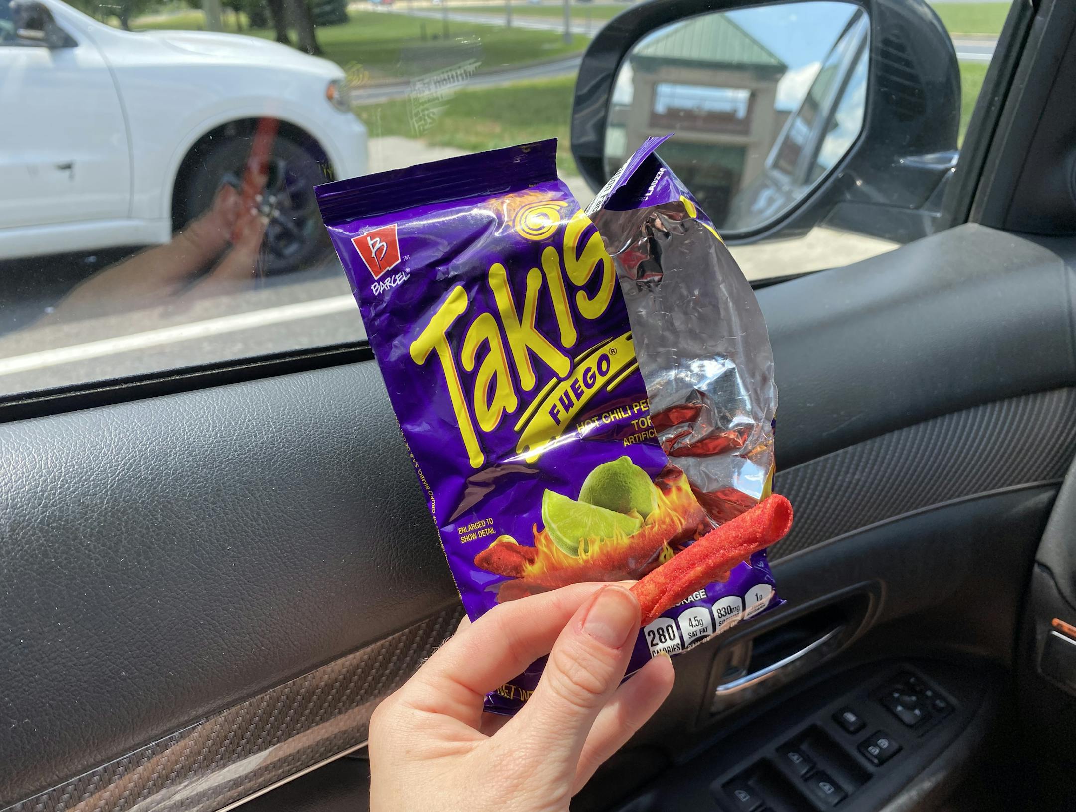 Natalie B. Compton holds Takis at a road trip stop in Hartford, New Jersey, on July 12, 2020. MUST CREDIT: Washington Post photo by Natalie B. Compton