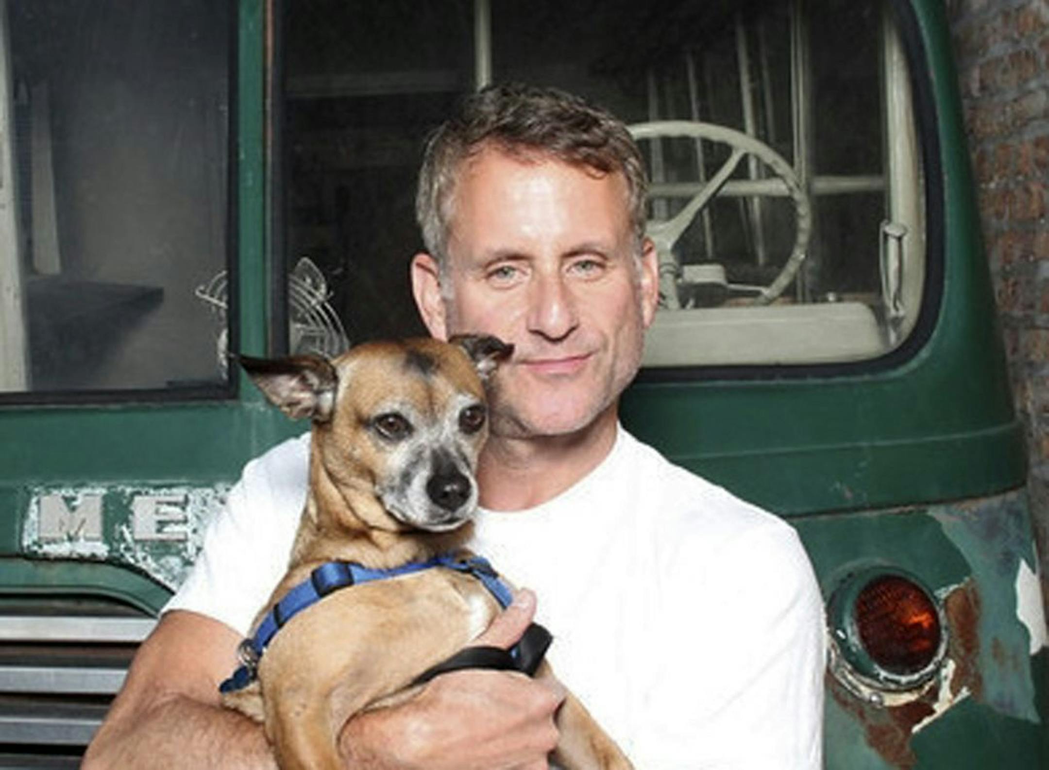 In this undated photo provided by Steve Gilberg, Gilberg and his dog Joey pose for photos in Chicago. The 6-year-old pug-Chihuahua mix came down with canine flu. "It was a Sunday morning and he just started coughing really, really hard, kind of like a smoker's hacking cough, coming from the belly," said Gilberg.