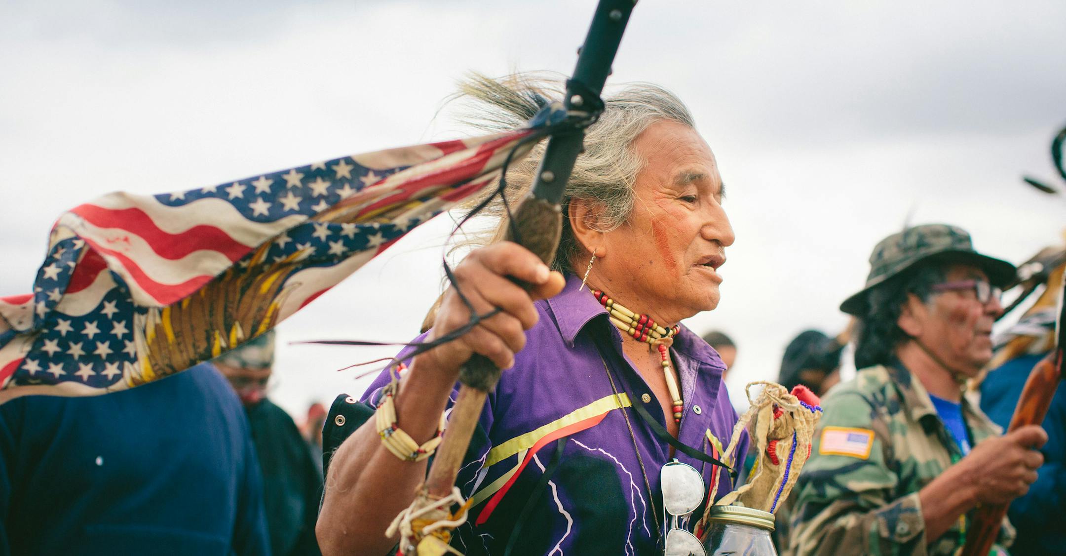 Phil Little Thunder Sr. carries water from his home, the Rosebud Reservation, during a protest march at the Standing Rock Indian Reservation in North Dakota, Sept. 9, 2016. A federal judge on Friday denied the Standing Rock Sioux Tribe’s efforts to halt the construction of a pipeline skirting the northern edge of the reservation on Friday; on the same day, the government ordered a the pipeline company to pause its work. (Alyssa Schukar/The New York Times)