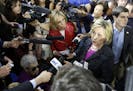 Democratic presidential candidate Hillary Rodham Clinton speaks to reporters after a round table discussion at Smuttynose Brewery, Friday, May 22, 201