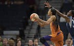 Phoenix's DeWanna Bonner (in orange) is a free-agent forward who could interest the Lynx, but they need a point guard more.
