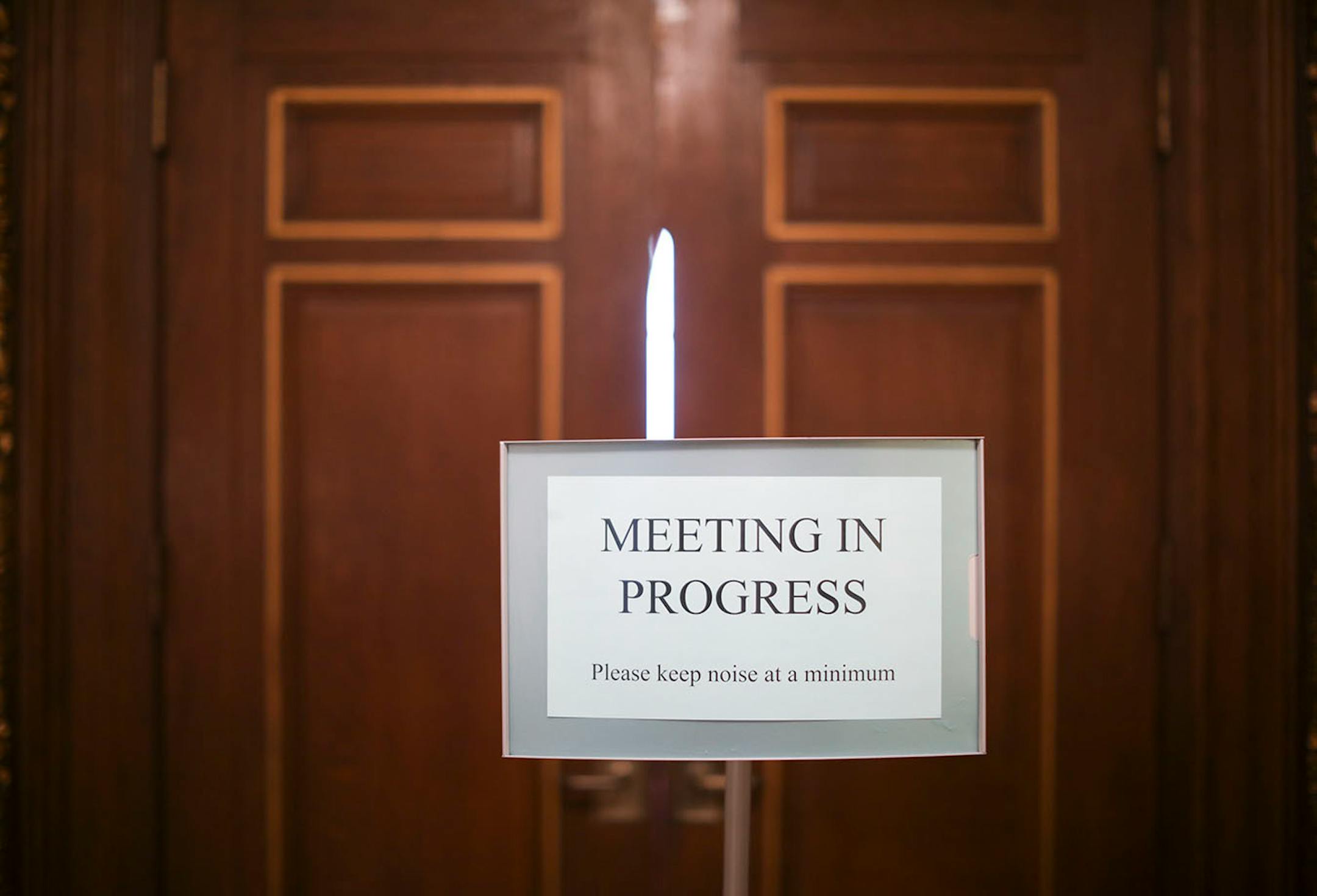 A meeting was going on in the room next to the Governor's office late Monday afternoon.