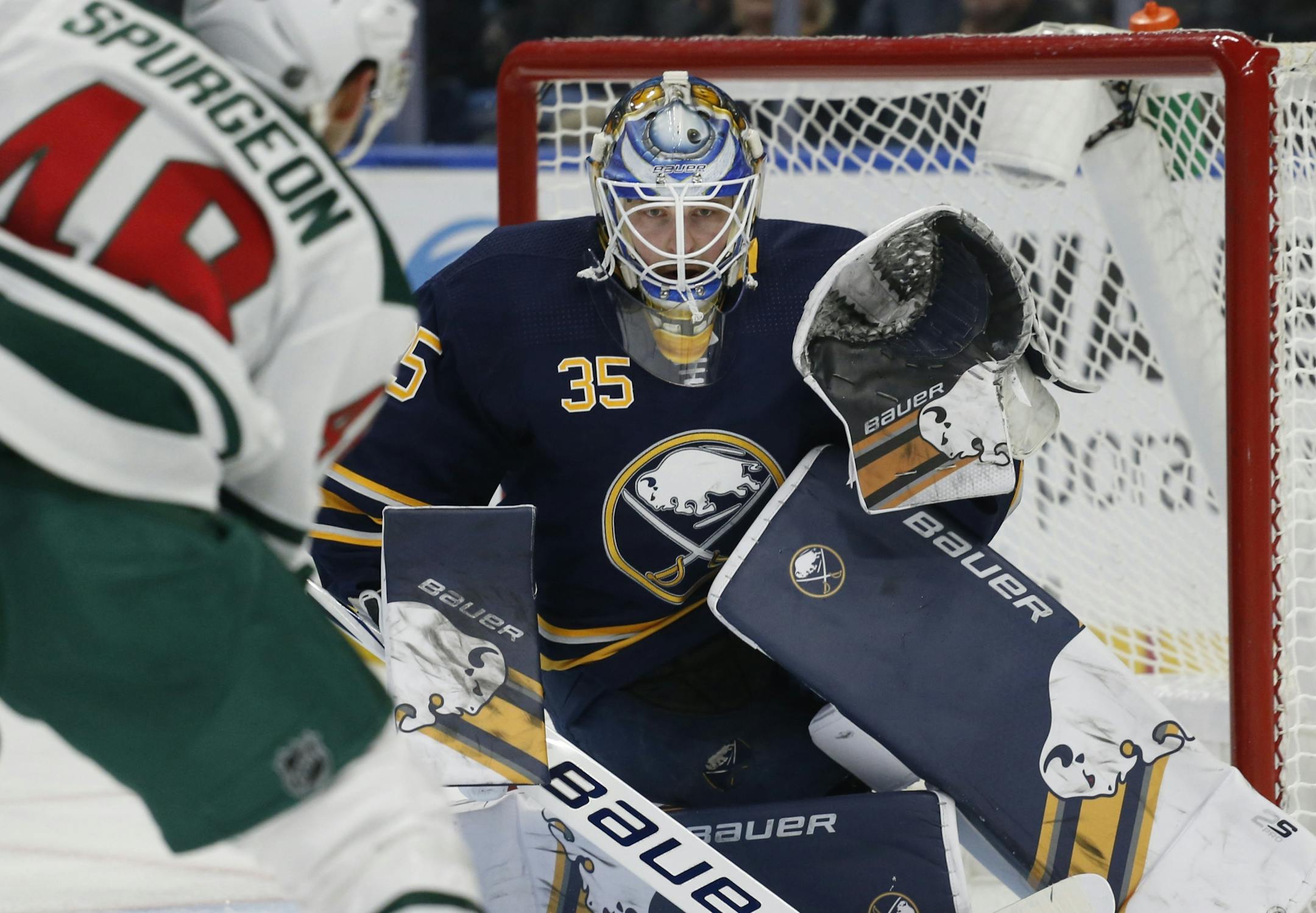 Buffalo Sabres goalie Linus Ullmark (35) keeps his eyes on the puck during the second period of an NHL hockey game against the Minnesota Wild, Tuesday, Feb. 5, 2019, in Buffalo N.Y.