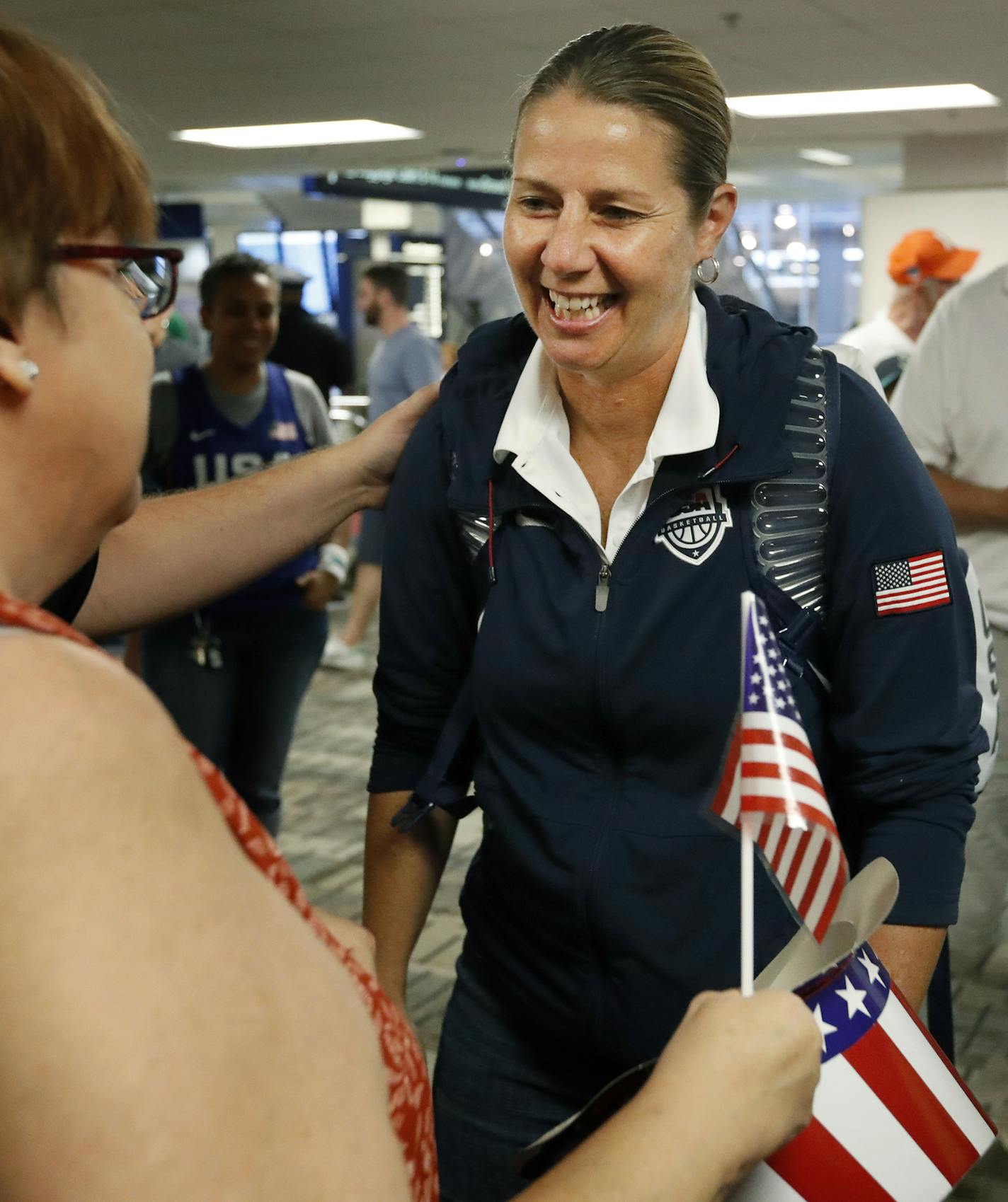 Minnesota Lynx coach Cheryl Reeve was greed by a fan at MSP. ] CARLOS GONZALEZ cgonzalez@startribune.com - August 22, 2016, Minneapolis, MN, MSP Airport, Four members of the Minnesota Lynx and coach Cheryl Reeve arrive home from the Olympics. Gold Medal Women&#xed;s Basketball