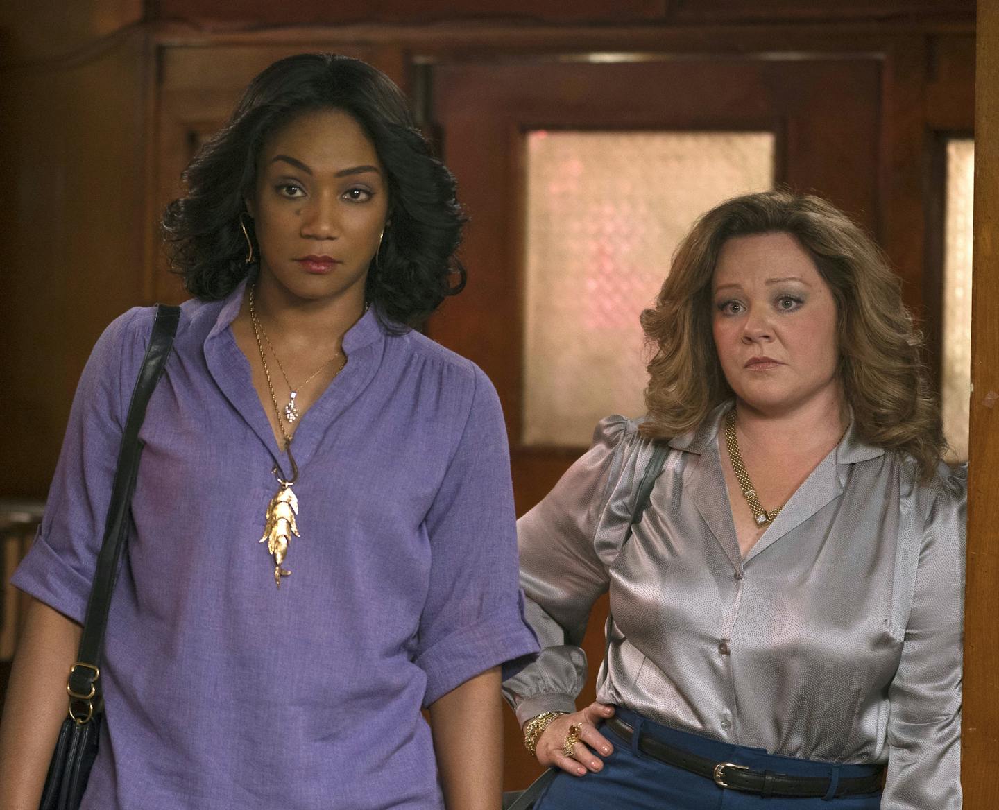 This image released by Warner Bros. Pictures shows, from left, Elisabeth Moss, Tiffany Haddish and Melissa McCarthy in a scene from "The Kitchen." (Alison Cohen Rosa/Warner Bros. Pictures via AP)