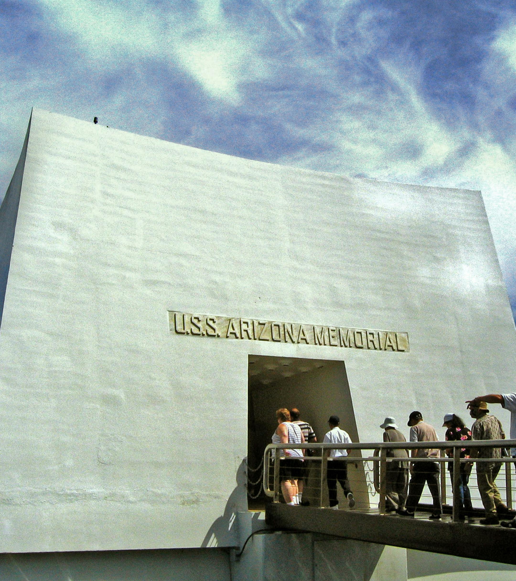 The 75th anniversary of the bombing of Pearl Harbor, which pulled the U.S. into World War II, will be marked on December 7, 2016. A popular tourist attraction will be the USS Arizona Memorial, where oil still seeps to the surface, creating a constant reminder of what is entombed beneath the surface, as in a May 2004 file image. (Mark Boster/Los Angeles Times/TNS)