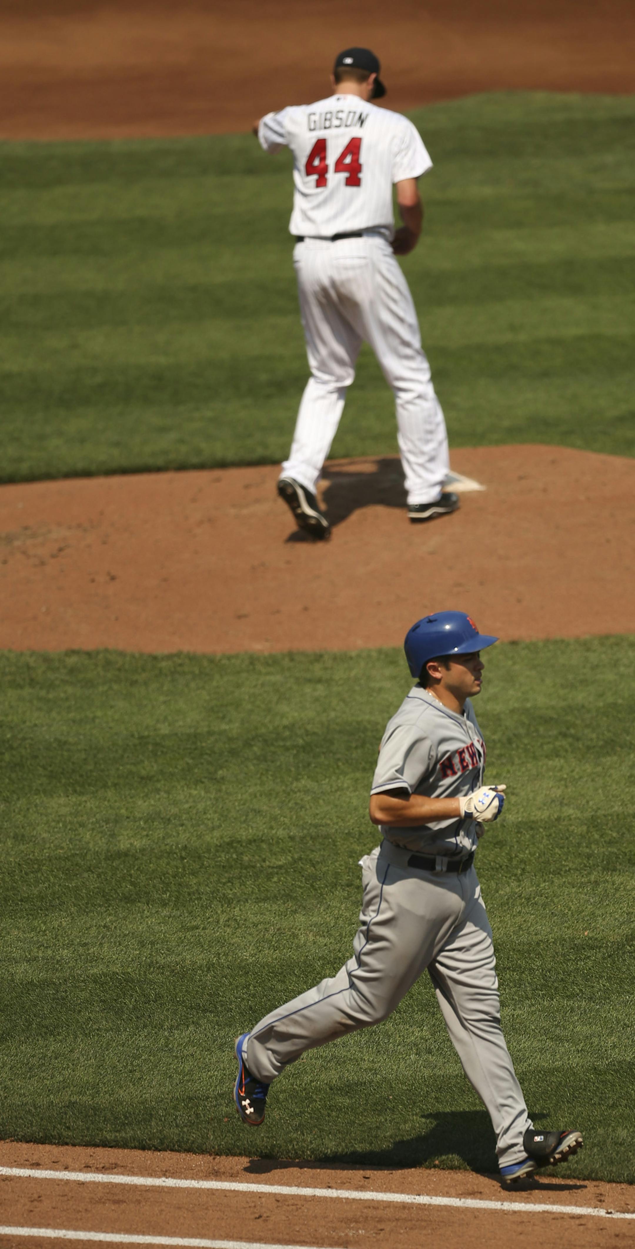 The Twins made up a snowed out game against the New York Mets with a 6-1 loss Monday afternoon, August 19, 2013 at Target Field in Minneapolis. The Mets' Travis d'Arnaud trotted to first after being walked by Twins' starter Kyle Gibson in the fourth inning. ] JEFF WHEELER ‚Ä¢ jeff.wheeler@startribune.com